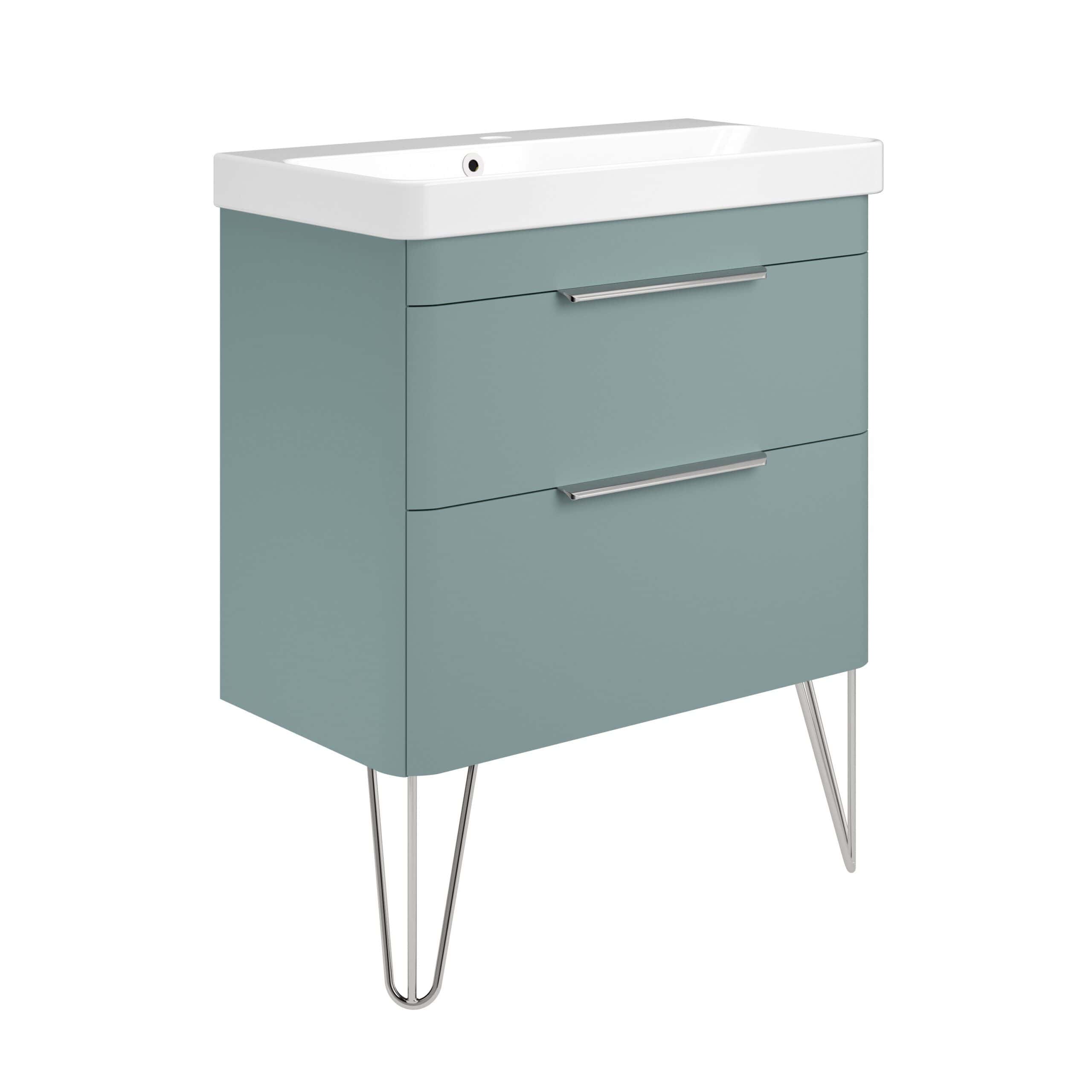 Vintage-style bathroom vanity unit with integrated sink, featuring a soft teal finish, sleek chrome handles, and slender metal legs, perfect for modern and retro bathroom decor.