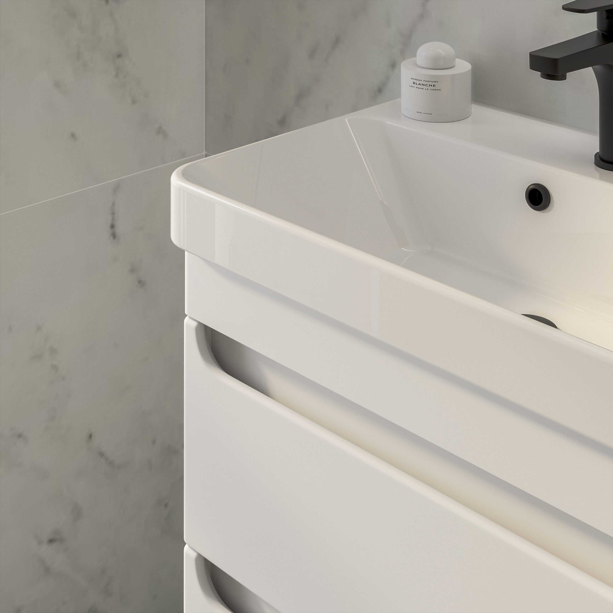 Sleek white bathroom vanity with built-in storage drawers, modern design, and minimalist style, featuring a white ceramic sink and black faucet, ideal for contemporary bathroom decor.