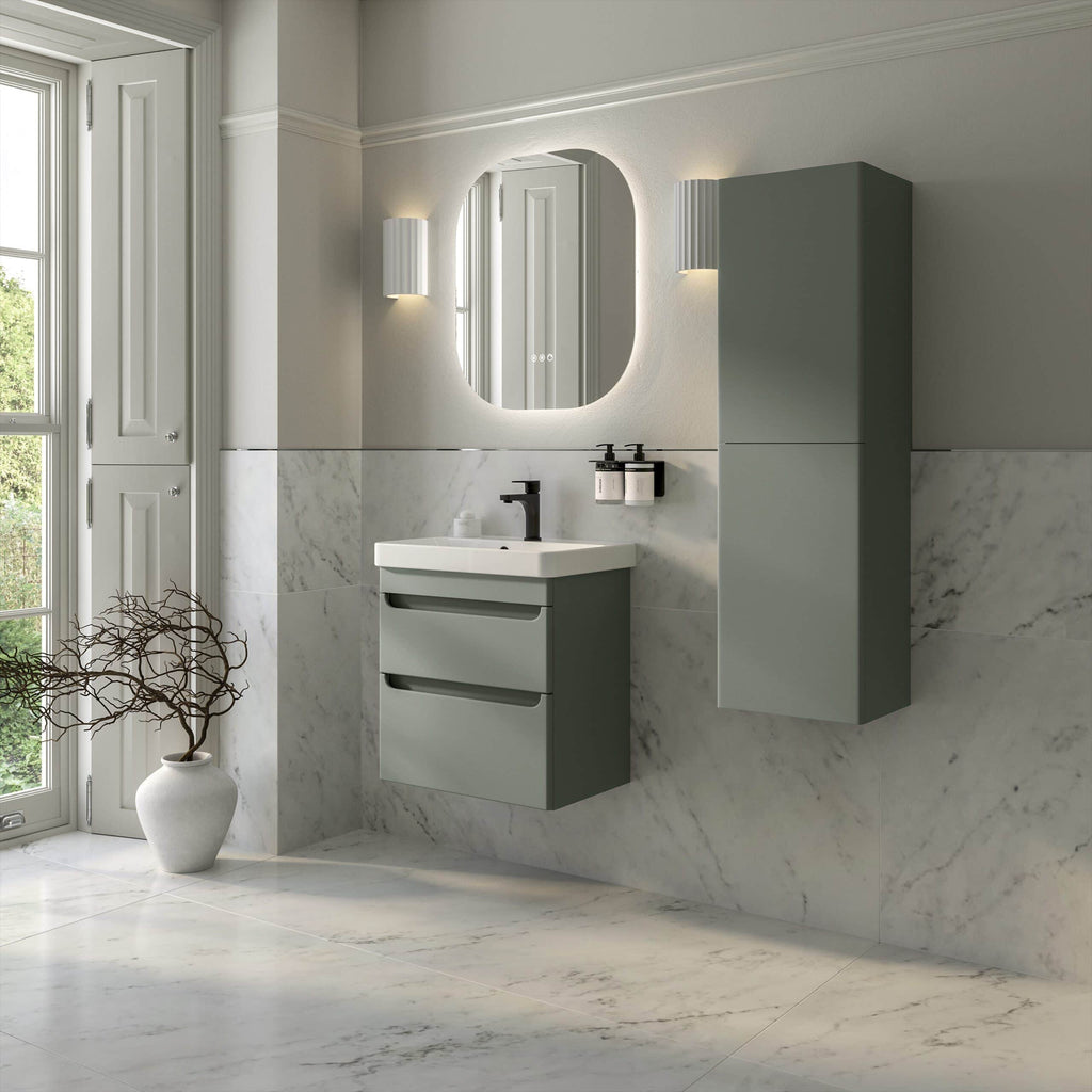 Modern grey bathroom vanity unit with integrated sink, wall-mounted storage cabinet, marble wall and floor tiles, and sleek black fixtures for a contemporary bathroom look.