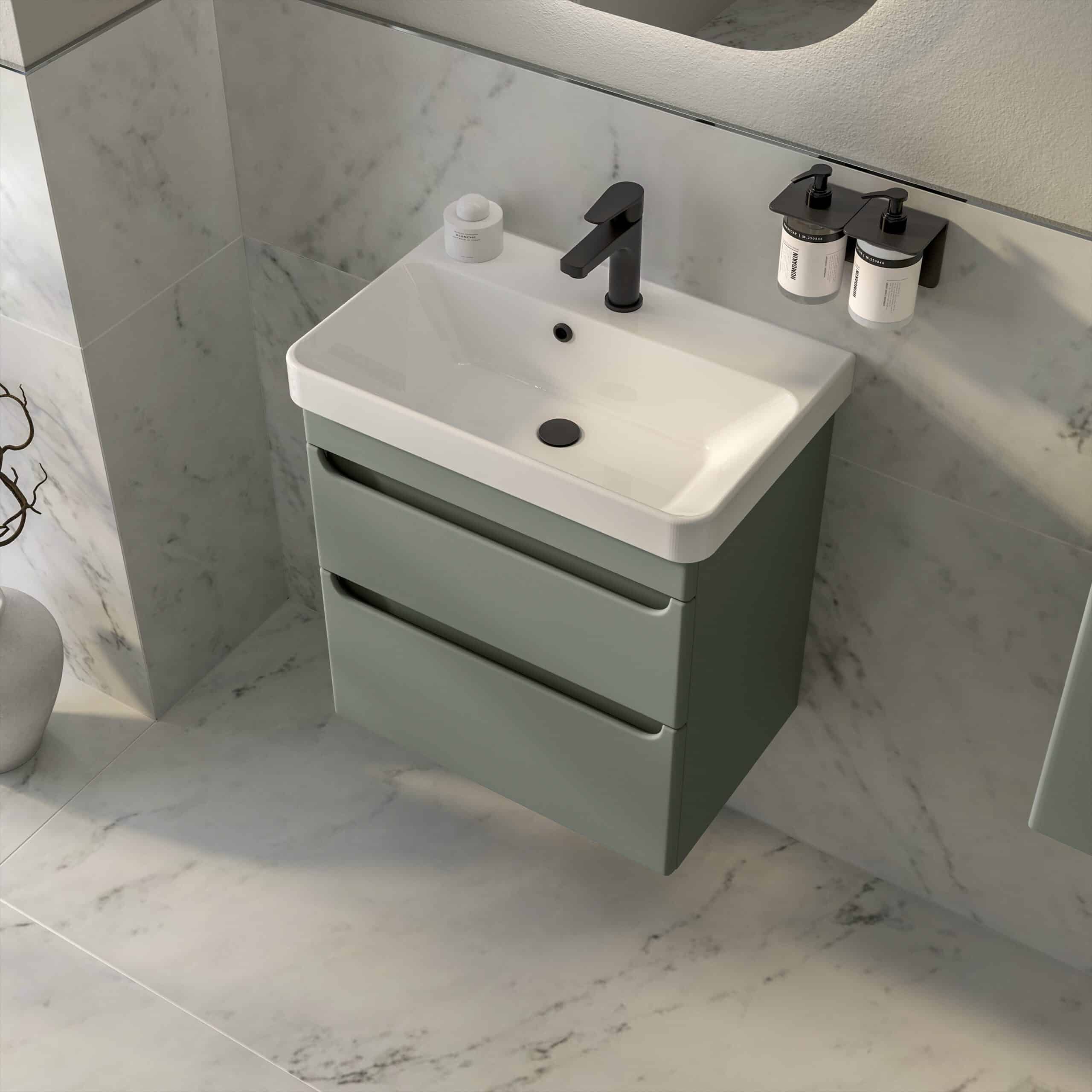 Modern wall-mounted bathroom vanity with a sleek white basin and grey drawers, featuring a black faucet and accessories, set against a marble wall for an elegant bathroom look.