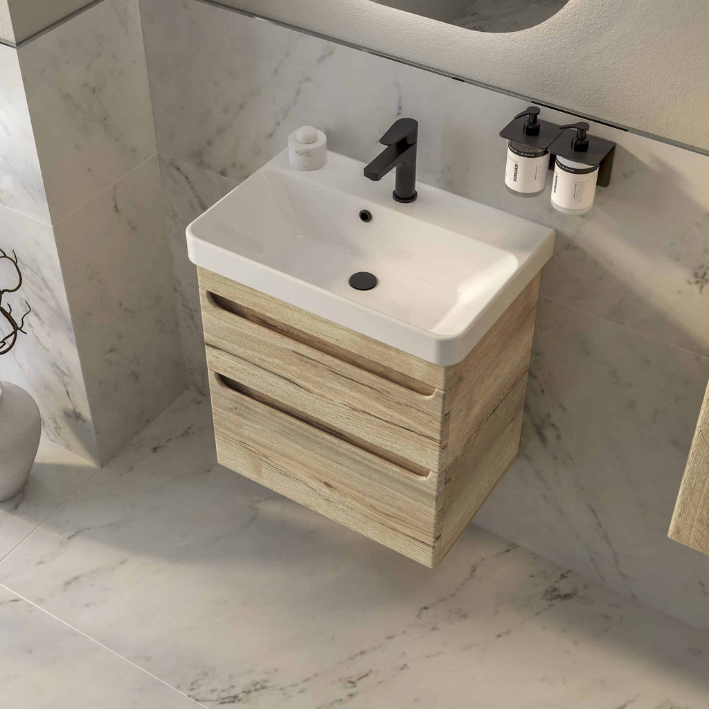 Modern wall-mounted bathroom vanity with a white ceramic sink, black matte faucet, and natural wood drawer cabinetry, featuring a sleek, minimalist design for contemporary bathrooms.