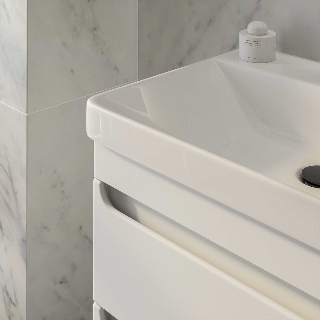Sleek white bathroom vanity with clean lines and modern design, featuring a spacious countertop and integrated storage, perfect for contemporary bathroom decor.