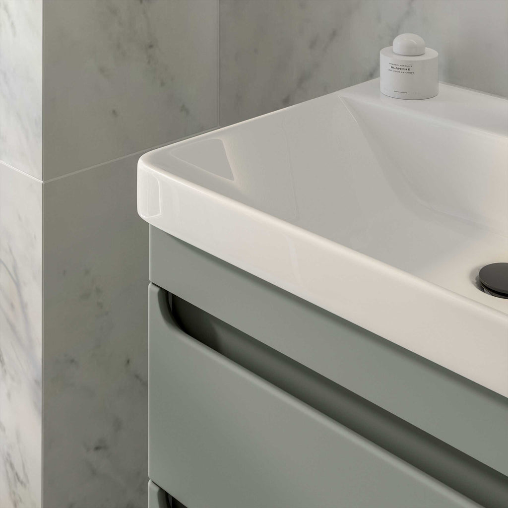 Sleek white bathroom sink with modern cabinet and grey walls, showcasing elegant bathroom furniture and fixtures for a contemporary bathroom design.