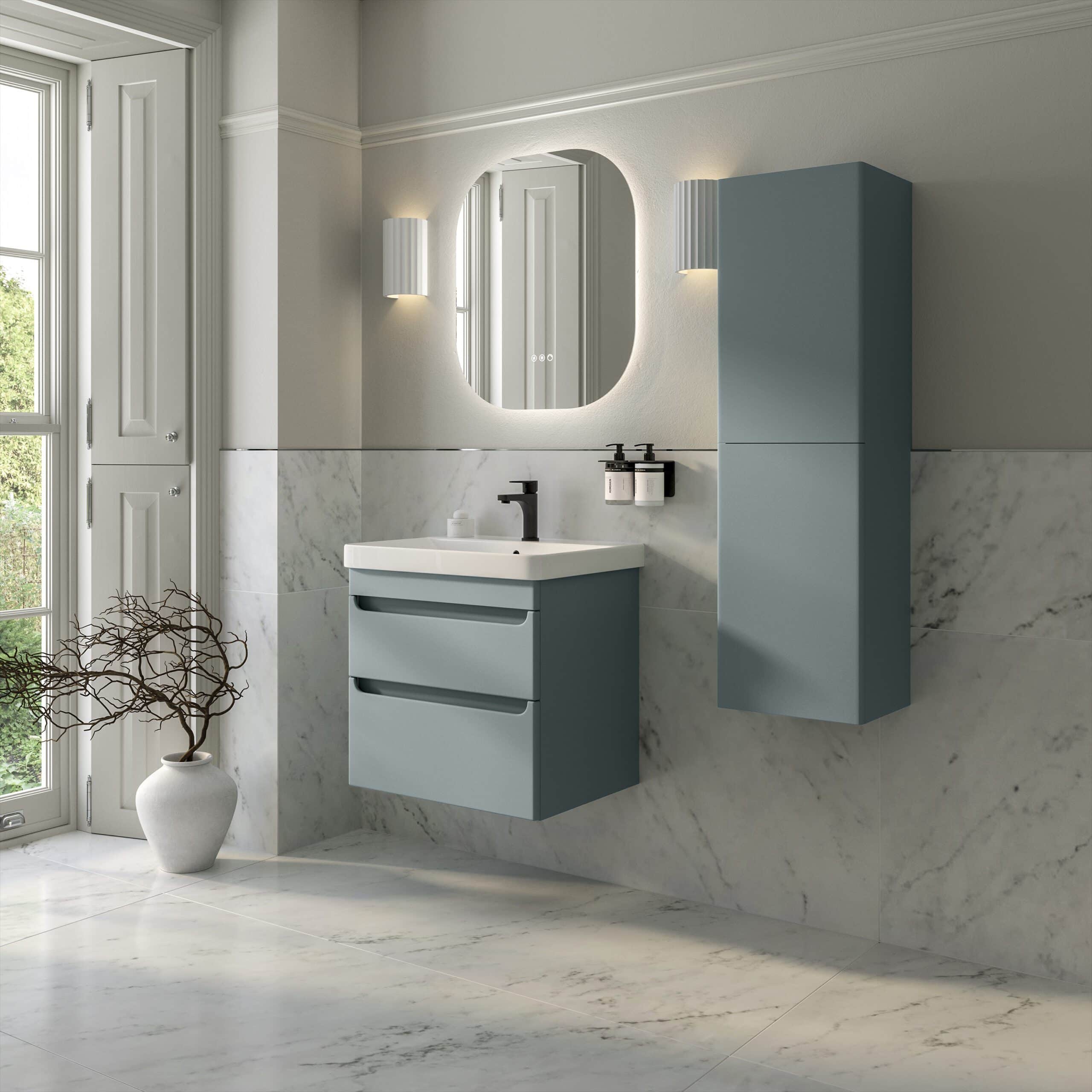 Modern blue bathroom vanity with integrated sink, matching wall cabinet, and stylish mirror in a contemporary bathroom setting. Perfect for minimalist and functional bathroom designs.
