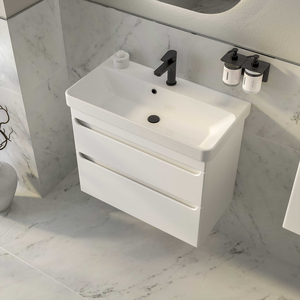 Sleek modern white bathroom vanity with integrated sink, black tap, and storage drawers, perfect for contemporary bathroom designs.