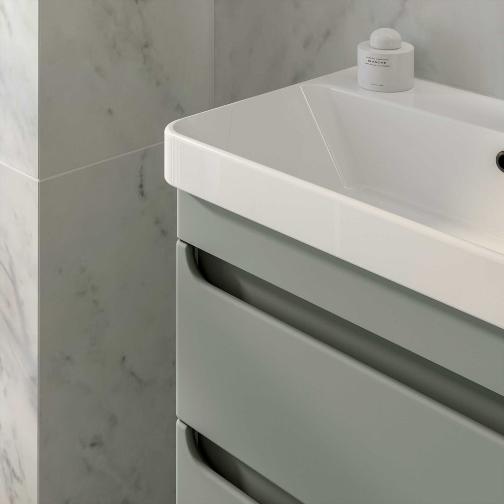 Sleek white bathroom vanity with integrated sink and grey drawer fronts, modern design for contemporary bathrooms.