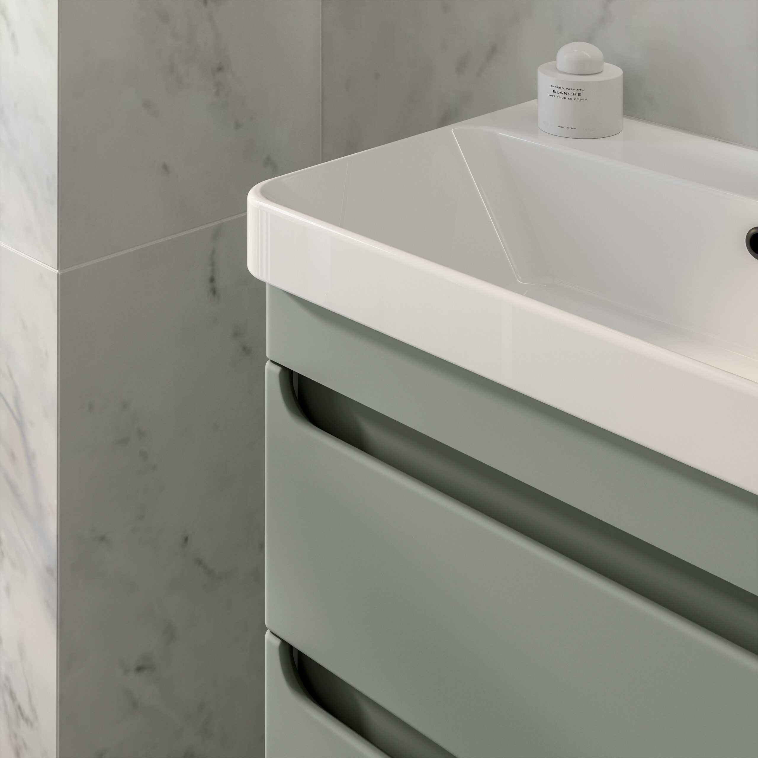 Sleek white bathroom vanity with integrated sink and grey drawer fronts, modern design for contemporary bathrooms.