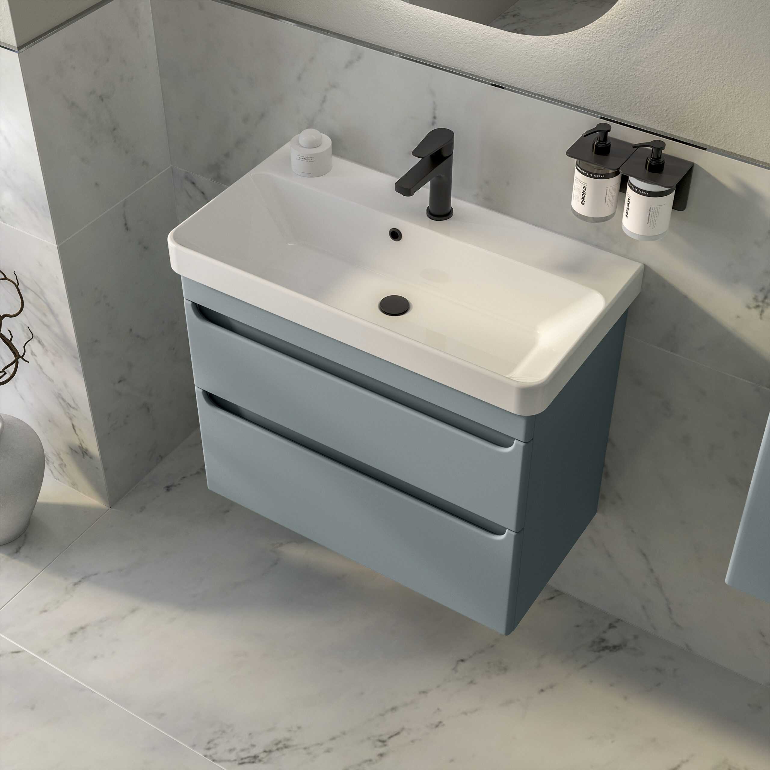 Modern grey bathroom vanity with integrated sink and black fixtures, ideal for contemporary bathroom renovations.