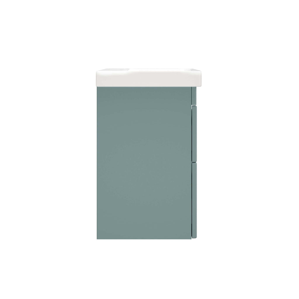 Modern bathroom vanity unit with a white ceramic sink in a sleek, minimalist design, featuring blue-grey cabinetry for a contemporary and functional bathroom storage solution.