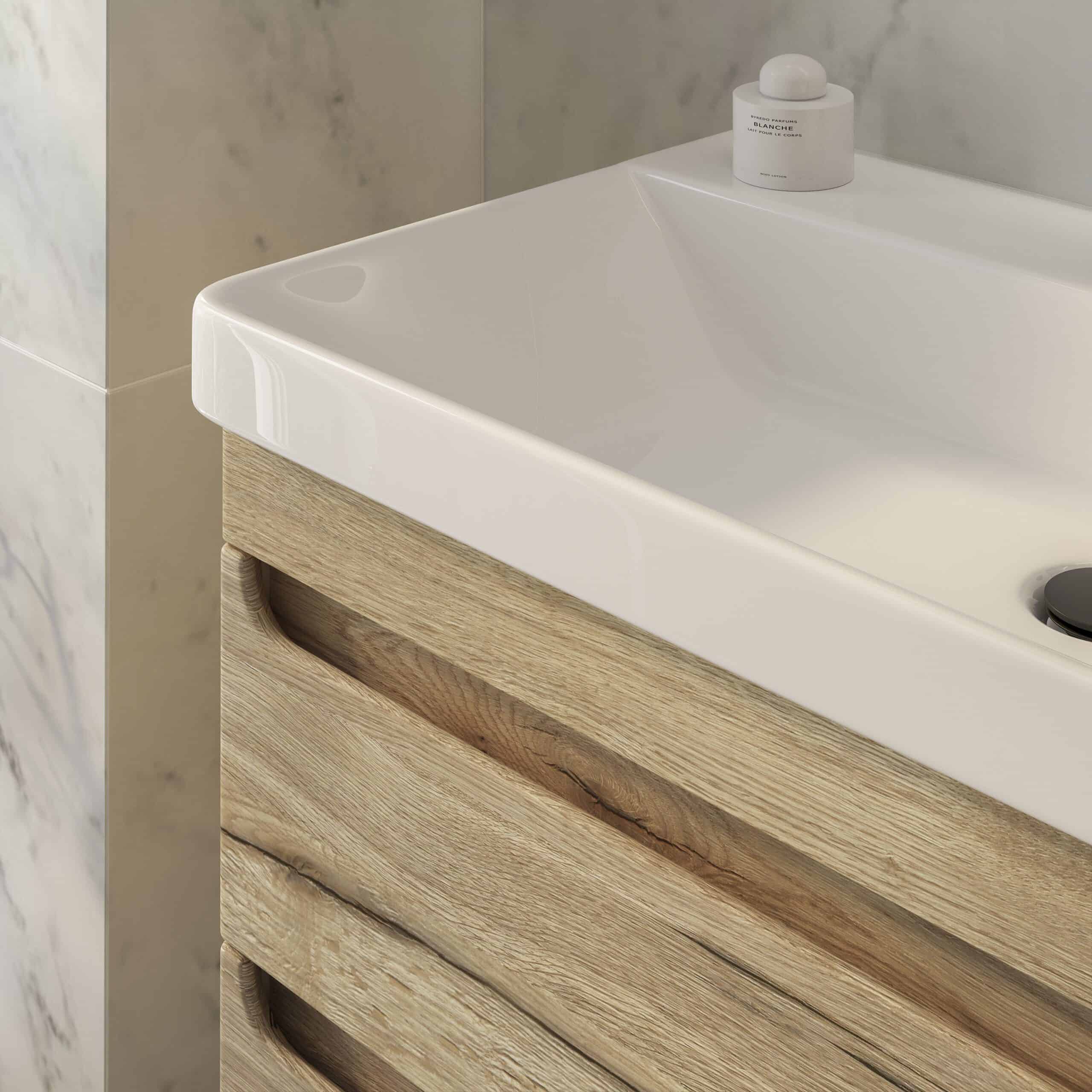 Modern bathroom vanity with a white ceramic sink and natural wood drawers, stylish and functional, perfect for contemporary bathroom designs.
