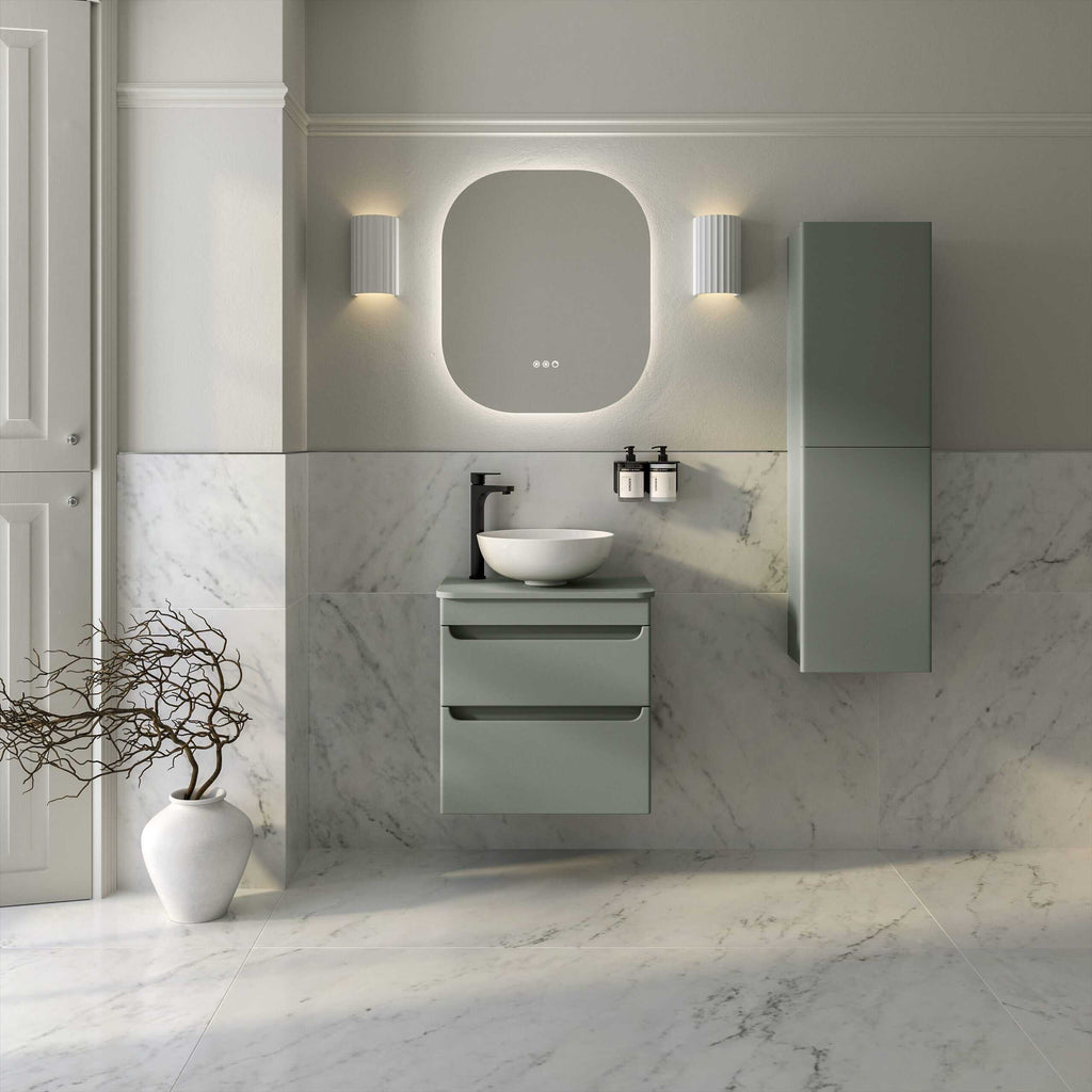 Sleek modern bathroom with minimalist grey cabinetry, marble tiles, and a stylish basin featuring black fixtures, creating a contemporary and elegant look.