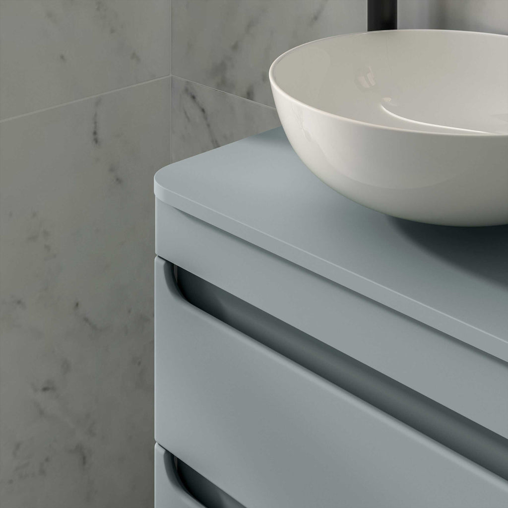 Sleek modern bathroom vanity unit with a grey finish and a stylish white vessel sink, designed for contemporary bathroom interiors, providing functional storage and elegant aesthetics.