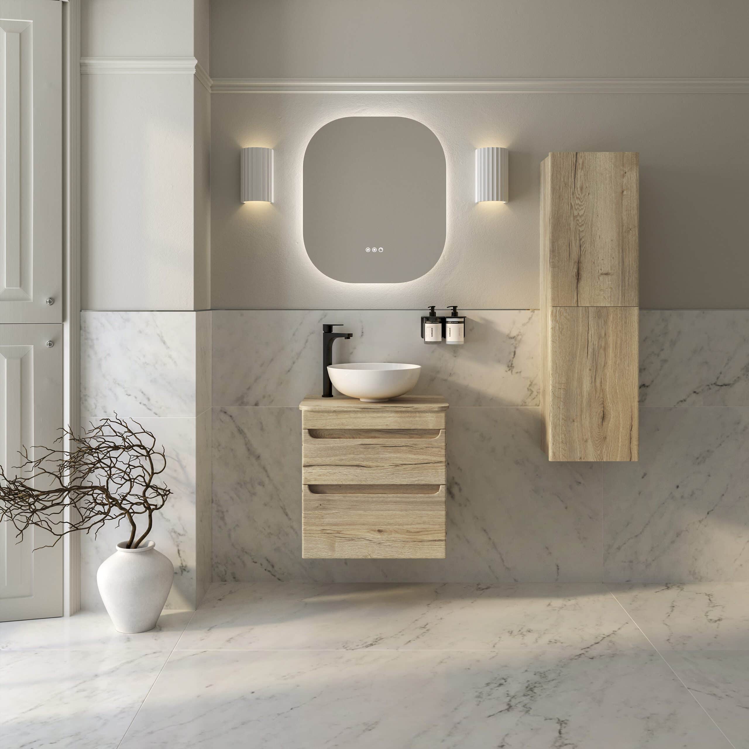 Modern minimalist bathroom interior with light wood vanity, vessel sink, round mirror, and marble wall and floor tiles, creating a sleek and elegant bathroom design.