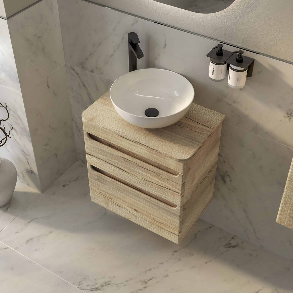 Sleek modern bathroom vanity with a round vessel sink, black faucet, and natural wooden storage drawers, designed for stylish and functional bathroom spaces.