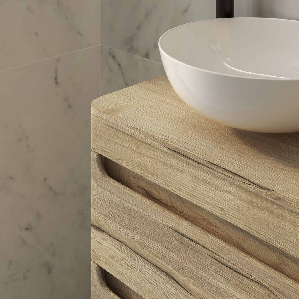 Handcrafted wooden bathroom vanity with a modern white vessel sink, perfect for contemporary Bubly Bathrooms installations. Durable teak wood finish enhances natural aesthetics.