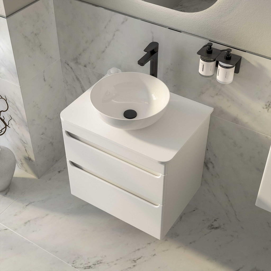 Sleek modern white bathroom vanity with round vessel sink and matte black fixtures, featuring integrated storage drawers for a minimalist bathroom update.