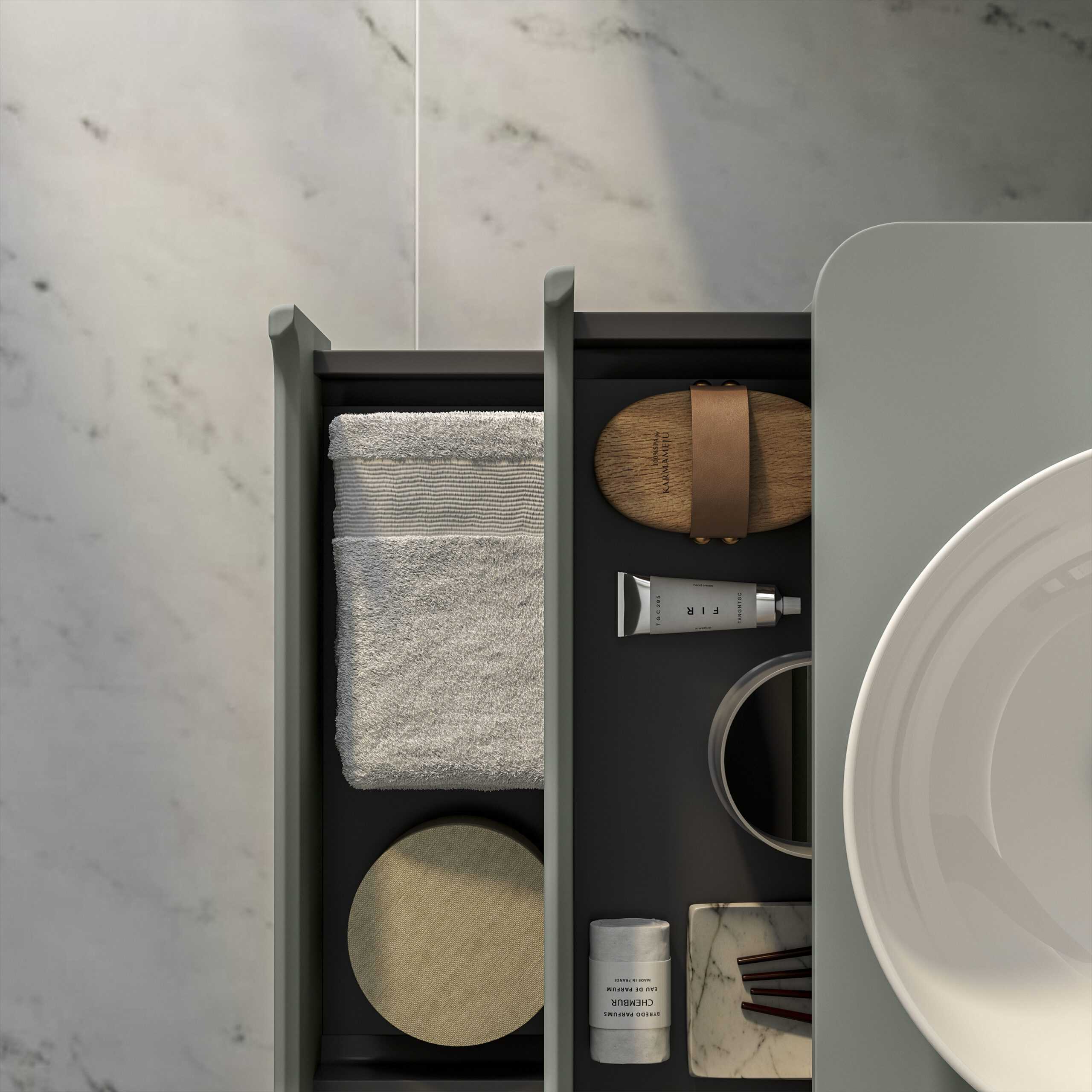 Neat bathroom organising drawer with essentials including skincare, towels, marble coaster, and wooden soap dish, showcasing elegant bathroom storage solutions.