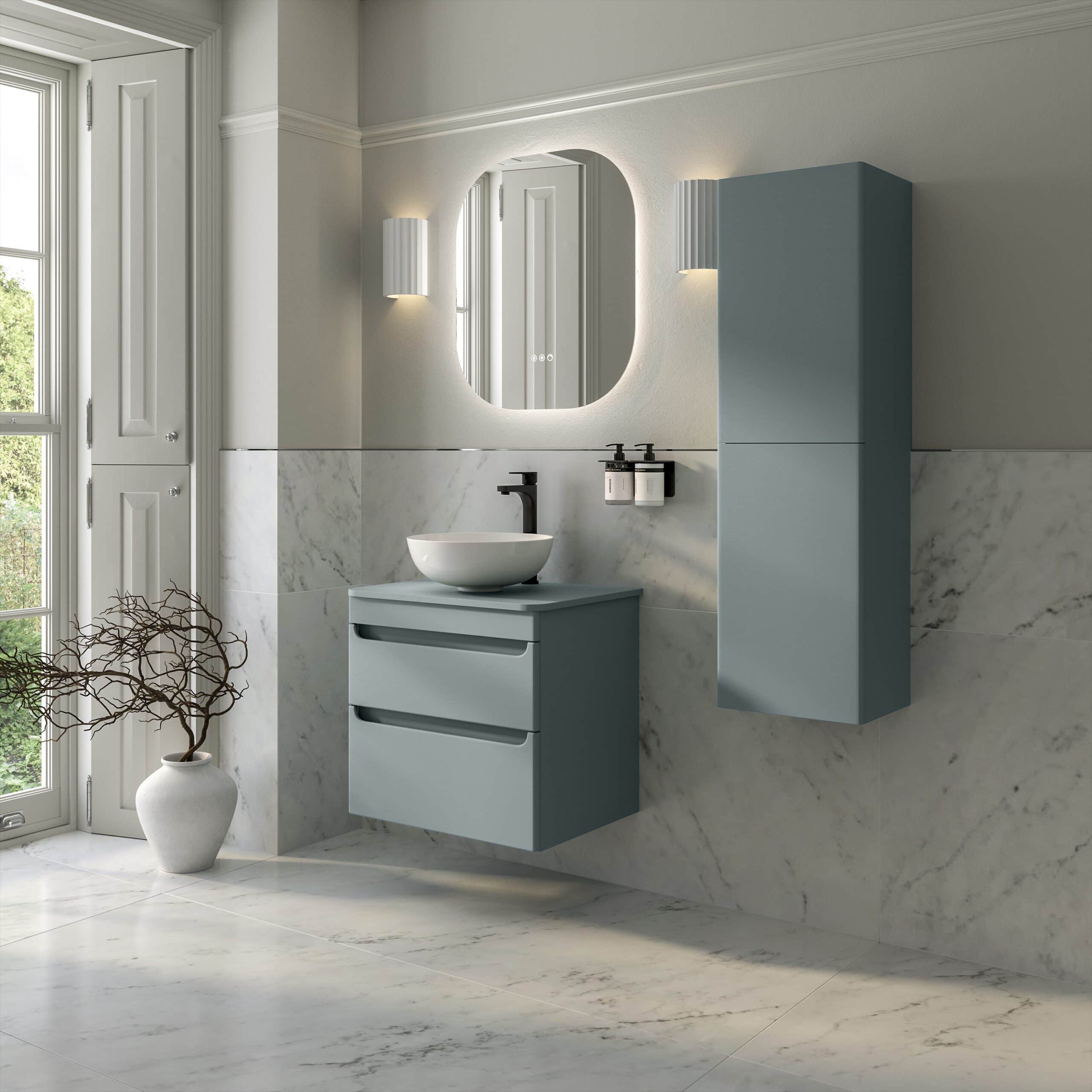 Elegant blue wall-mounted bathroom vanity with integrated drawers, vessel sink, and contemporary black faucet in a modern bathroom setting with marble tiles and minimalist style.