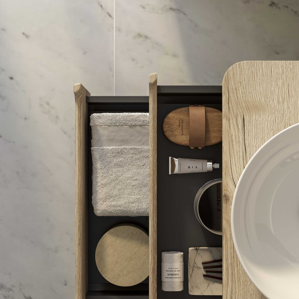 Organised bathroom storage with towel, skincare, and accessory compartments, showcasing modern bathroom organisation solutions for a stylish and functional space.
