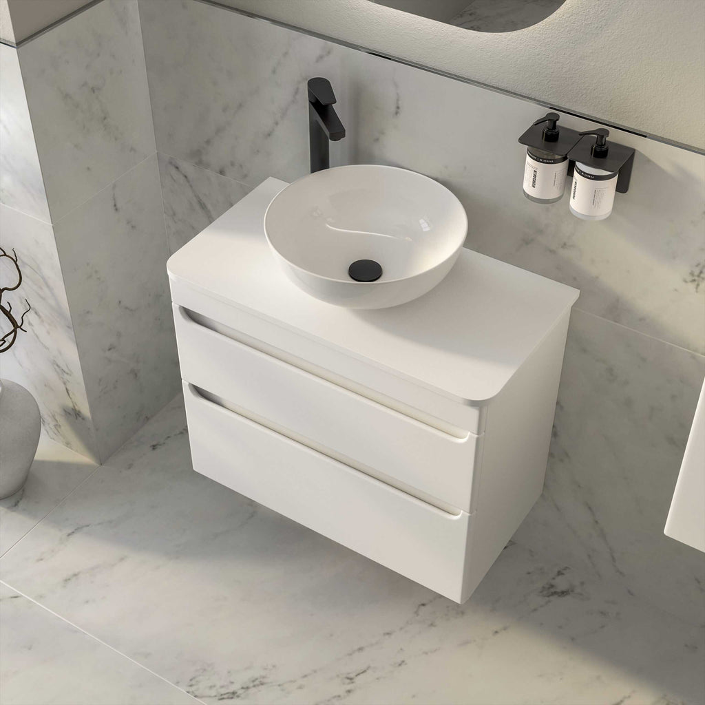 Sleek white bathroom vanity with a modern round vessel sink and black faucet, designed for contemporary bathroom interiors. Featuring storage drawers and minimalist style.