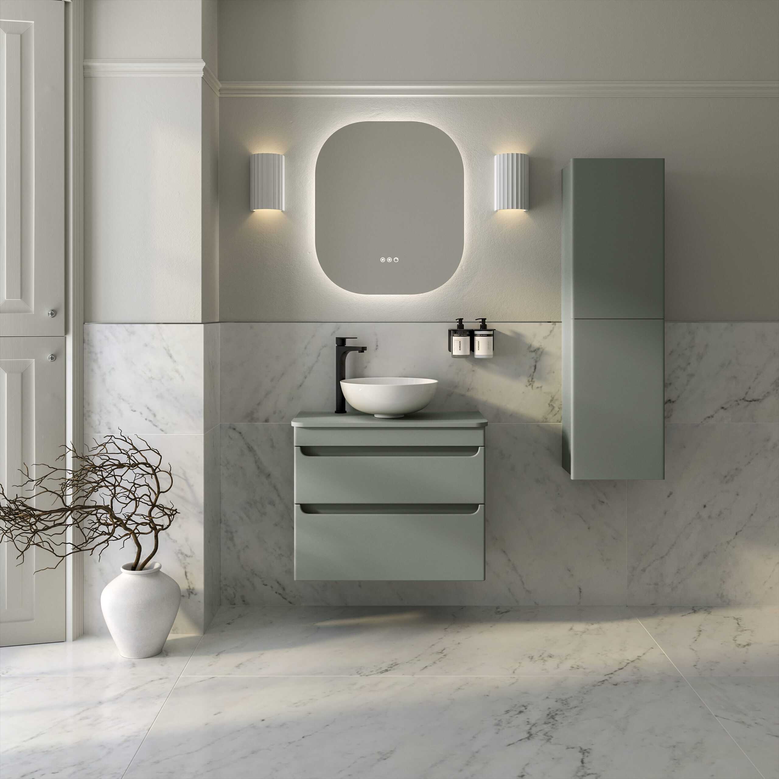 Modern minimalist bathroom with grey bathroom vanity, circular vessel sink, wall-mounted soap dispensers, and sleek mirror, featuring marble tiled walls and floor for a luxurious look.