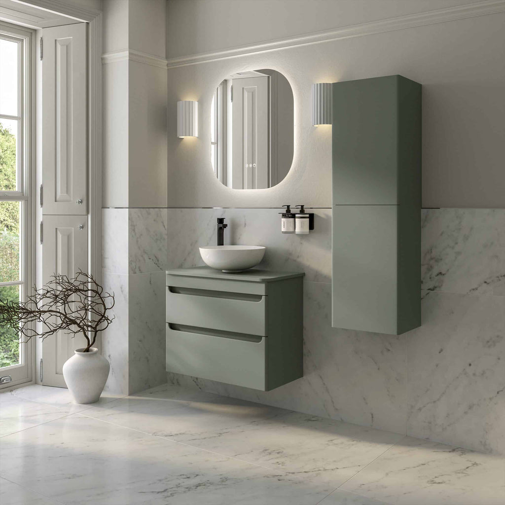 Contemporary bathroom vanity unit with a round white sink, black tap, mounted on a marble-tiled wall, with stylish wall-mounted lights and an elegant mirror, in a modern bathroom setting.