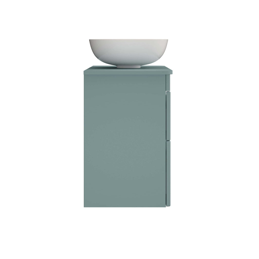 White ceramic bathroom basin on a modern blue vanity unit for an elegant bathroom design. Perfect for contemporary bathroom renovations and stylish fixtures.