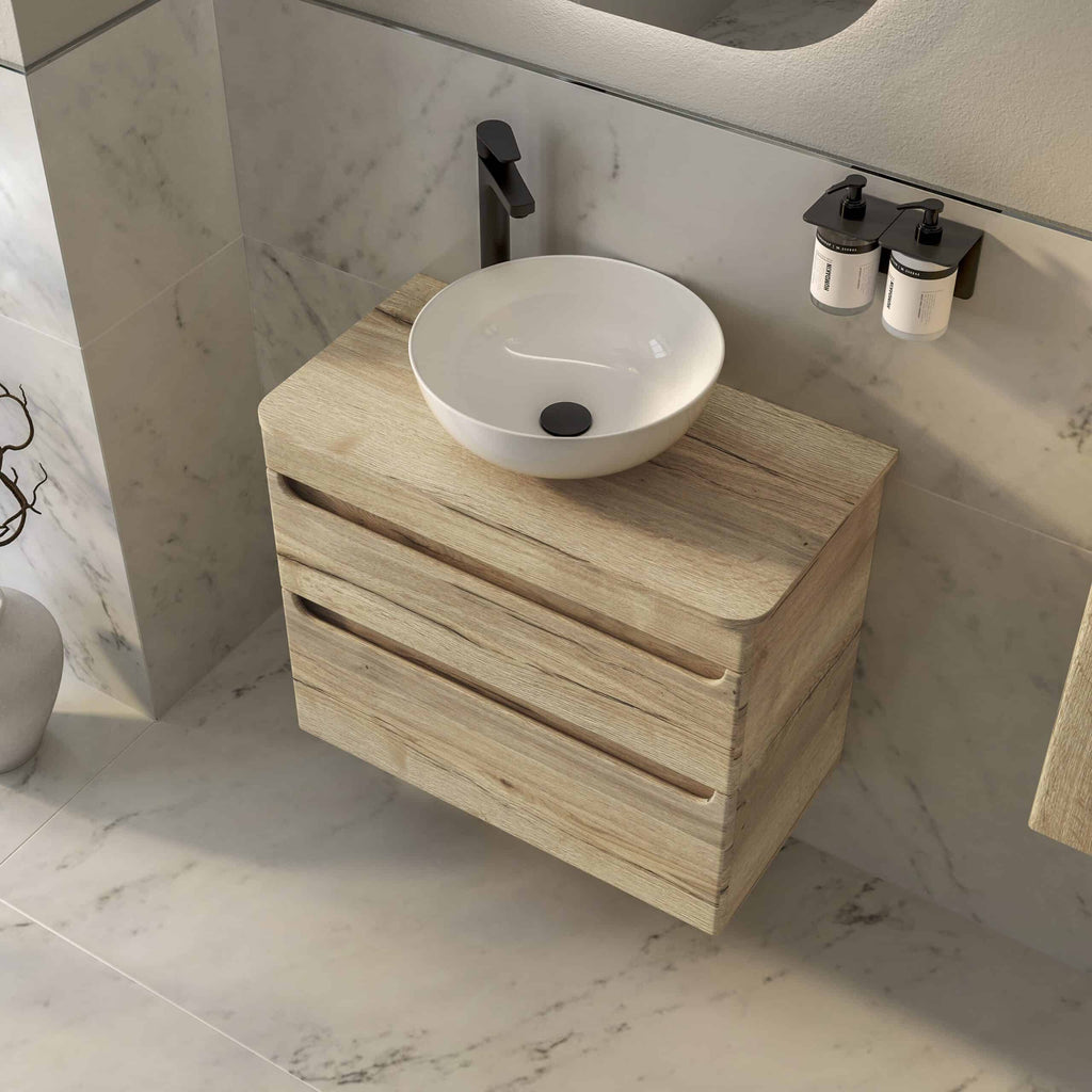 Floating wooden bathroom vanity with round vessel sink and modern black fixtures, in a contemporary bathroom design.