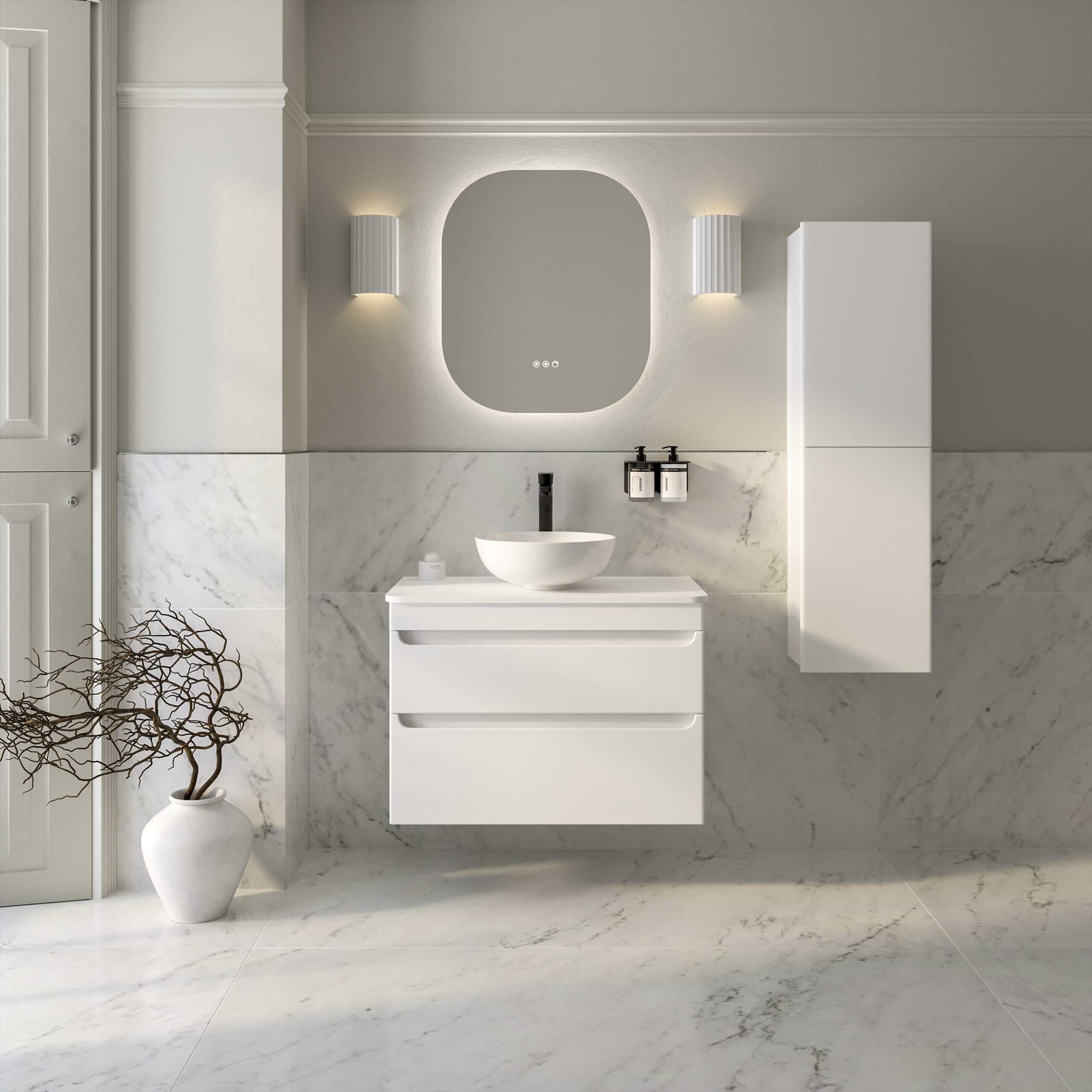 Modern white bathroom vanity with basin and sleek mirror, featuring contemporary lighting and marble tiles for a stylish, minimalistic bathroom design.