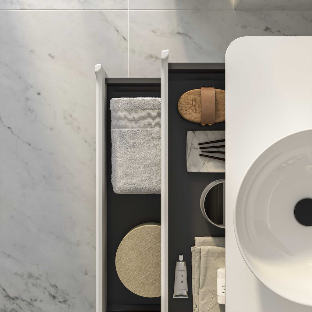 Soft grey and beige bathroom towels with elegant accessories and storage solutions, showcasing modern bathroom organisation and decor from Bubly Bathrooms.