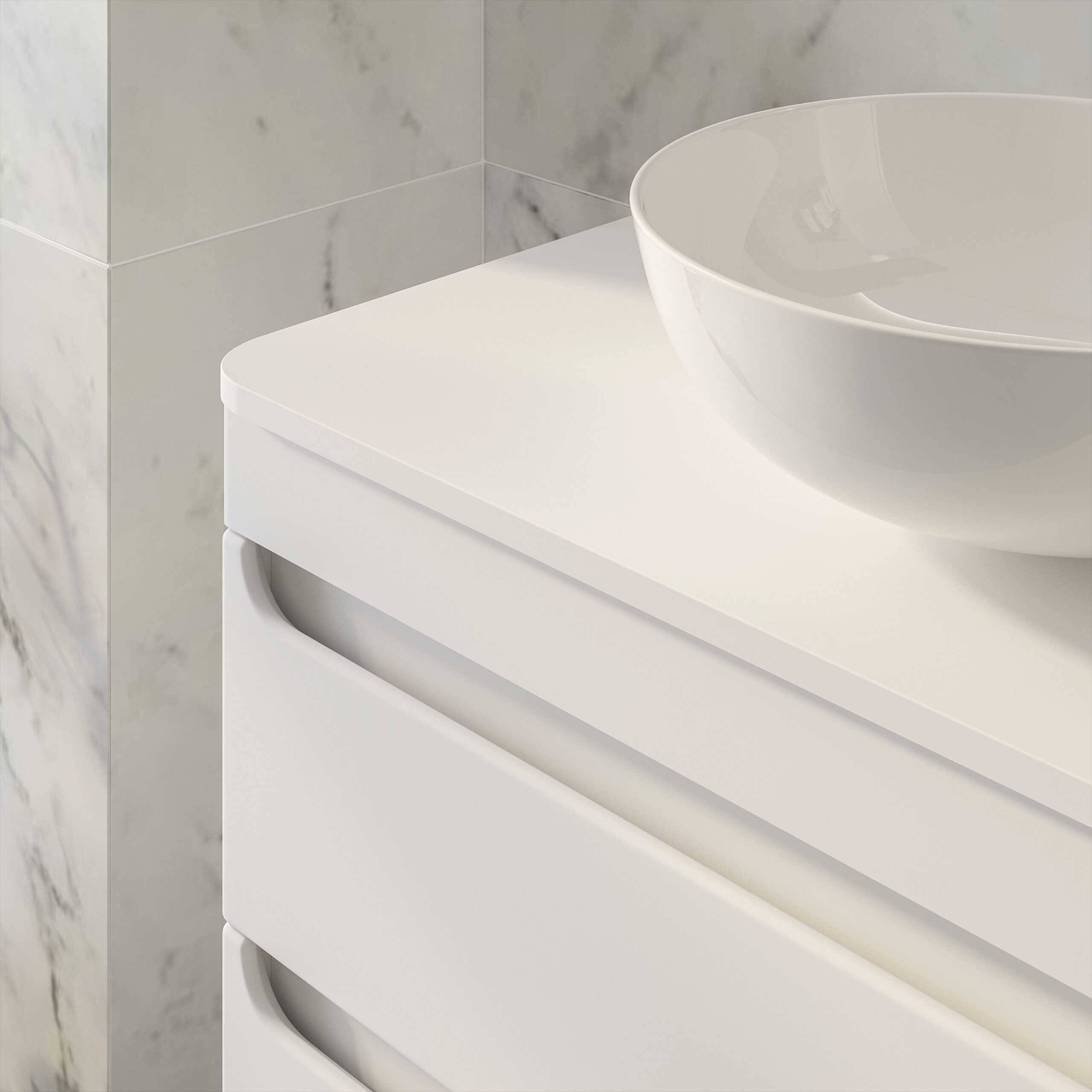 Contemporary white bathroom vanity with a sleek design, featuring a modern basin sink on a marble tiled wall, perfect for enhancing bathroom aesthetics and functionality.