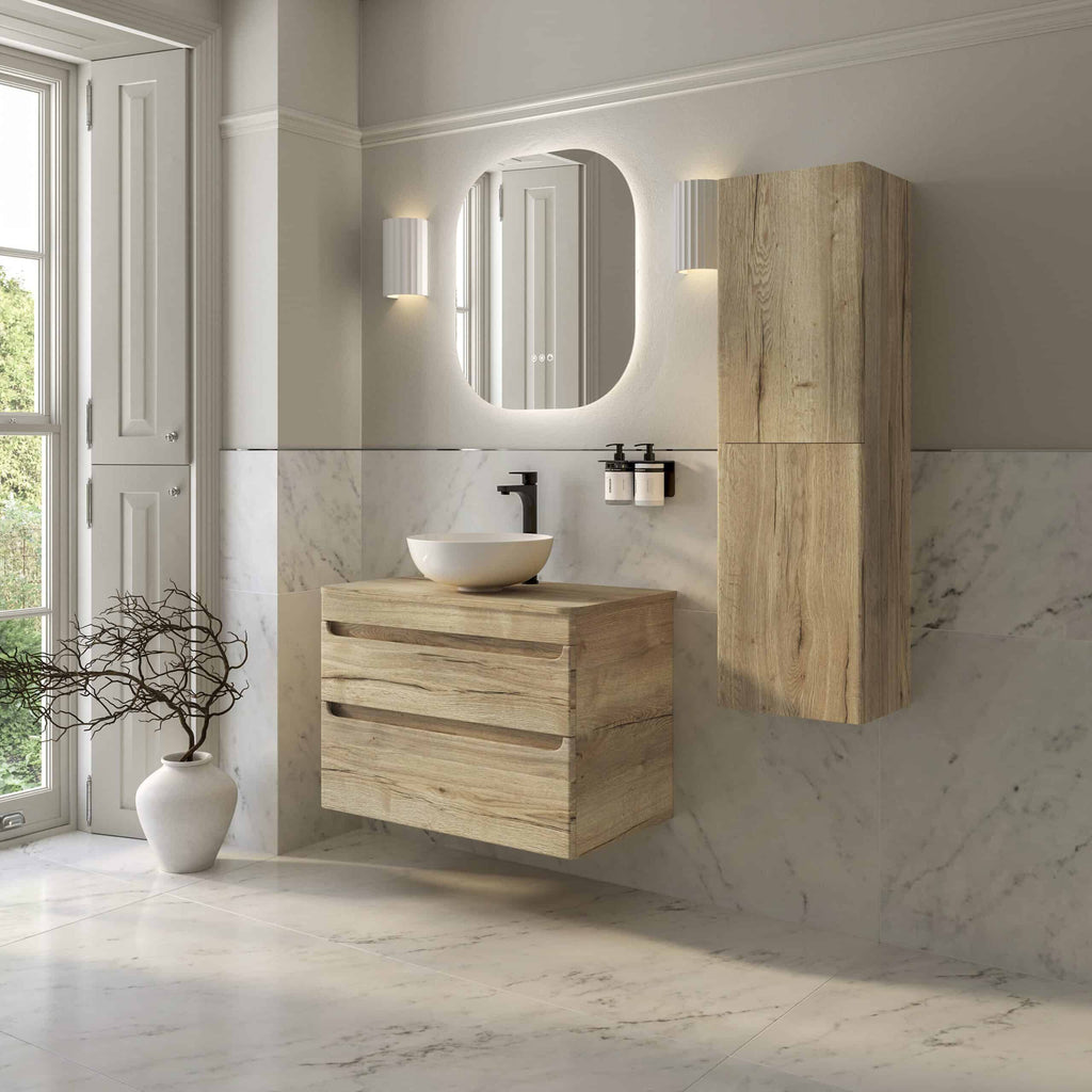 Natural wood bathroom vanity with vessel sink and wall-mounted storage cabinet in a modern, minimalist bathroom design. Featuring elegant marble walls and ambient lighting.