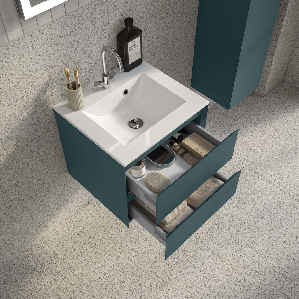Modern bathroom vanity unit with integrated sink, storage drawers, and stylish teal finish, ideal for contemporary bathroom bathrooms refurbishment or upgrades.