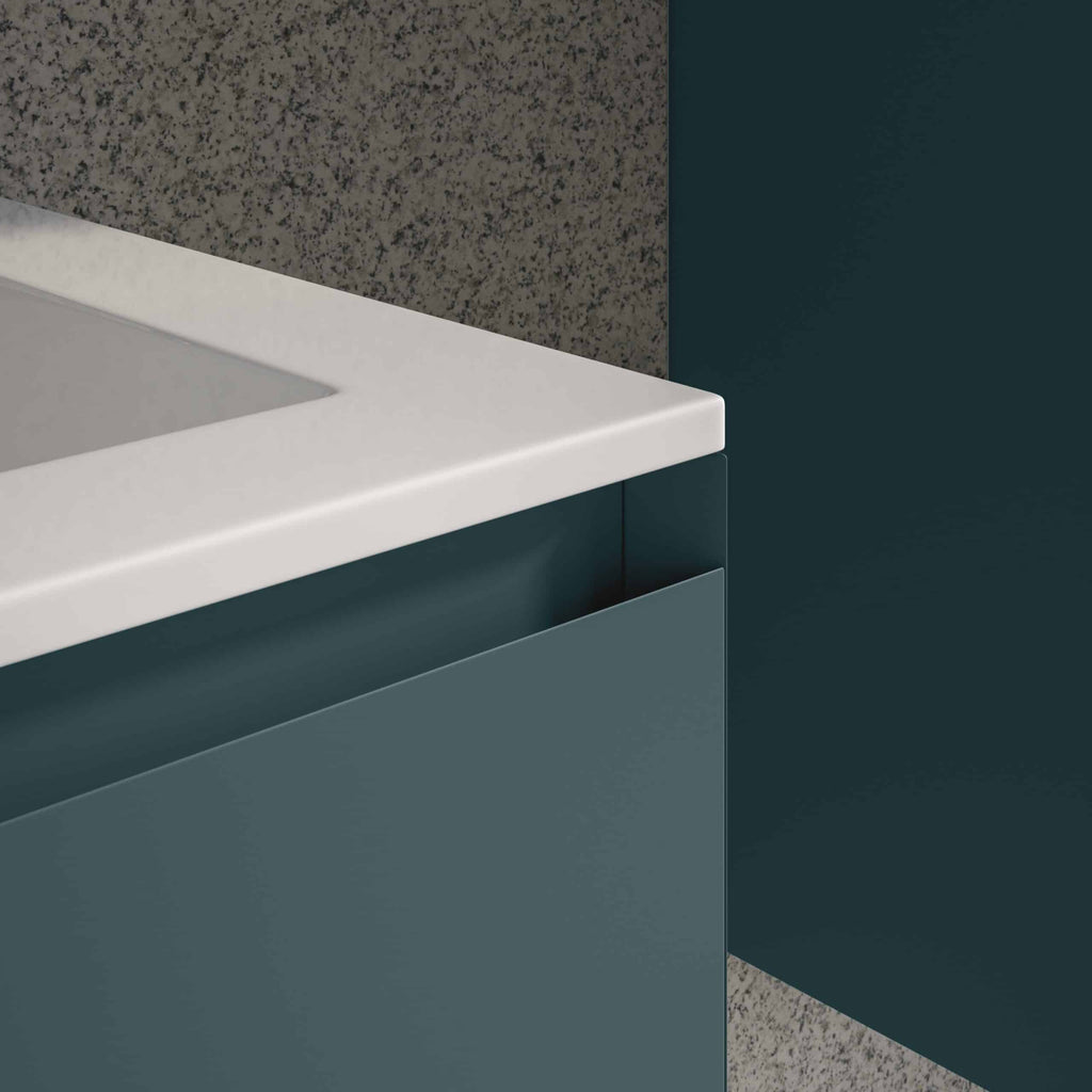 Sleek modern bathroom vanity with navy blue cabinetry and a white marble countertop, designed for contemporary style and optimal bathroom organisation.