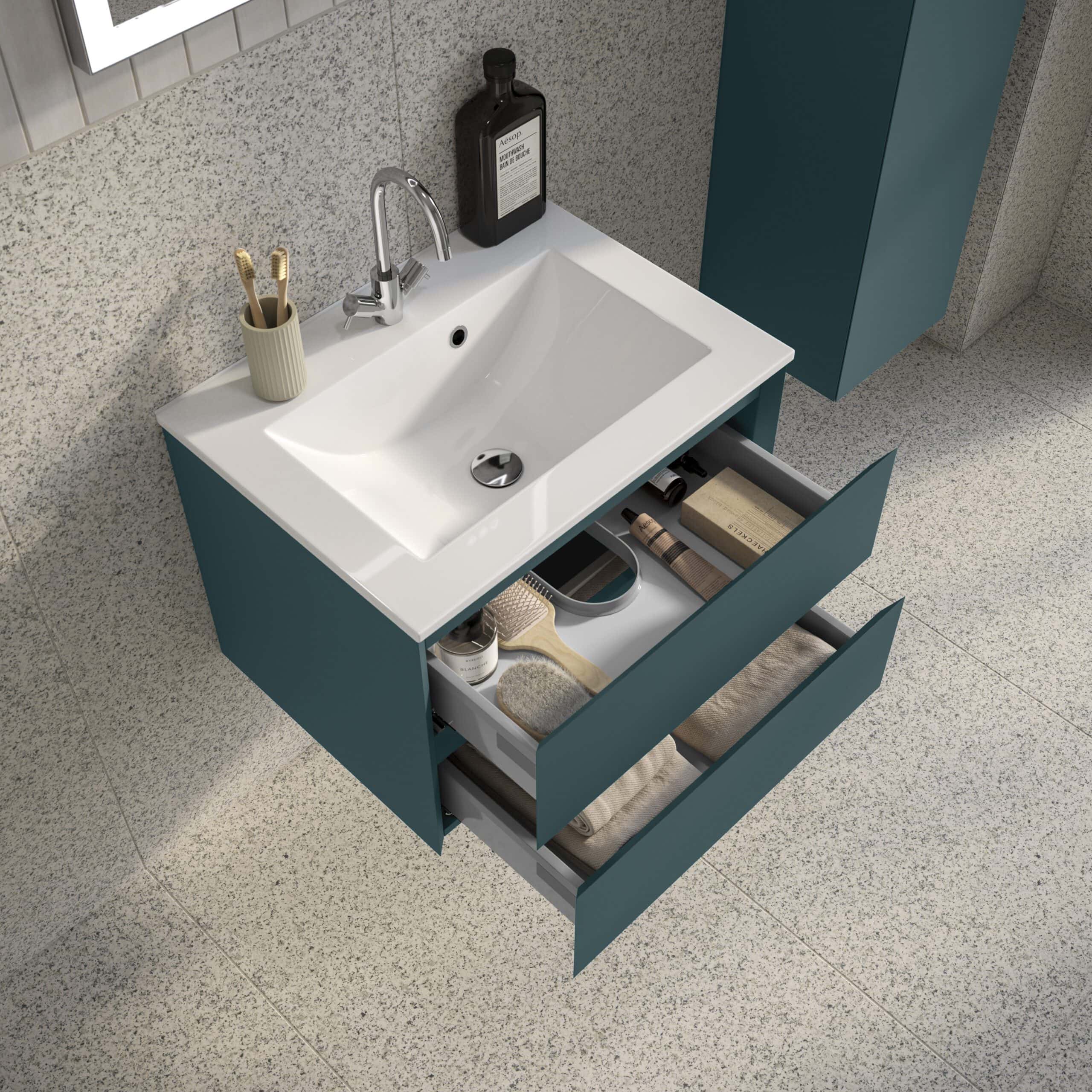 Sleek blue bathroom vanity with integrated white ceramic sink, open drawers with storage space for toiletries, towels, and grooming essentials, modern design and functional organisation.