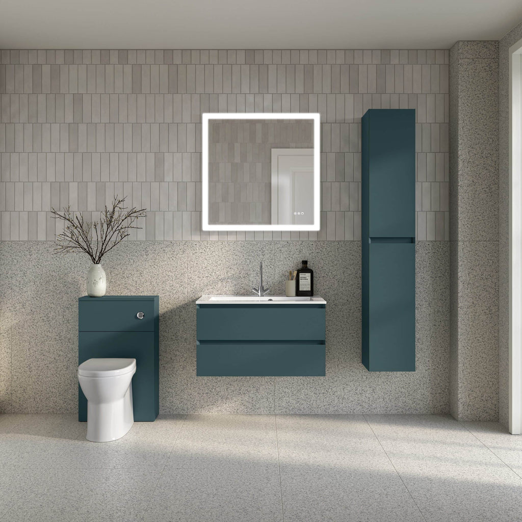 Contemporary blue bathroom vanity with sink, wall-mounted mirror with LED lighting, tall storage cabinet, and modern toilet in a stylish, minimalistic bathroom design.