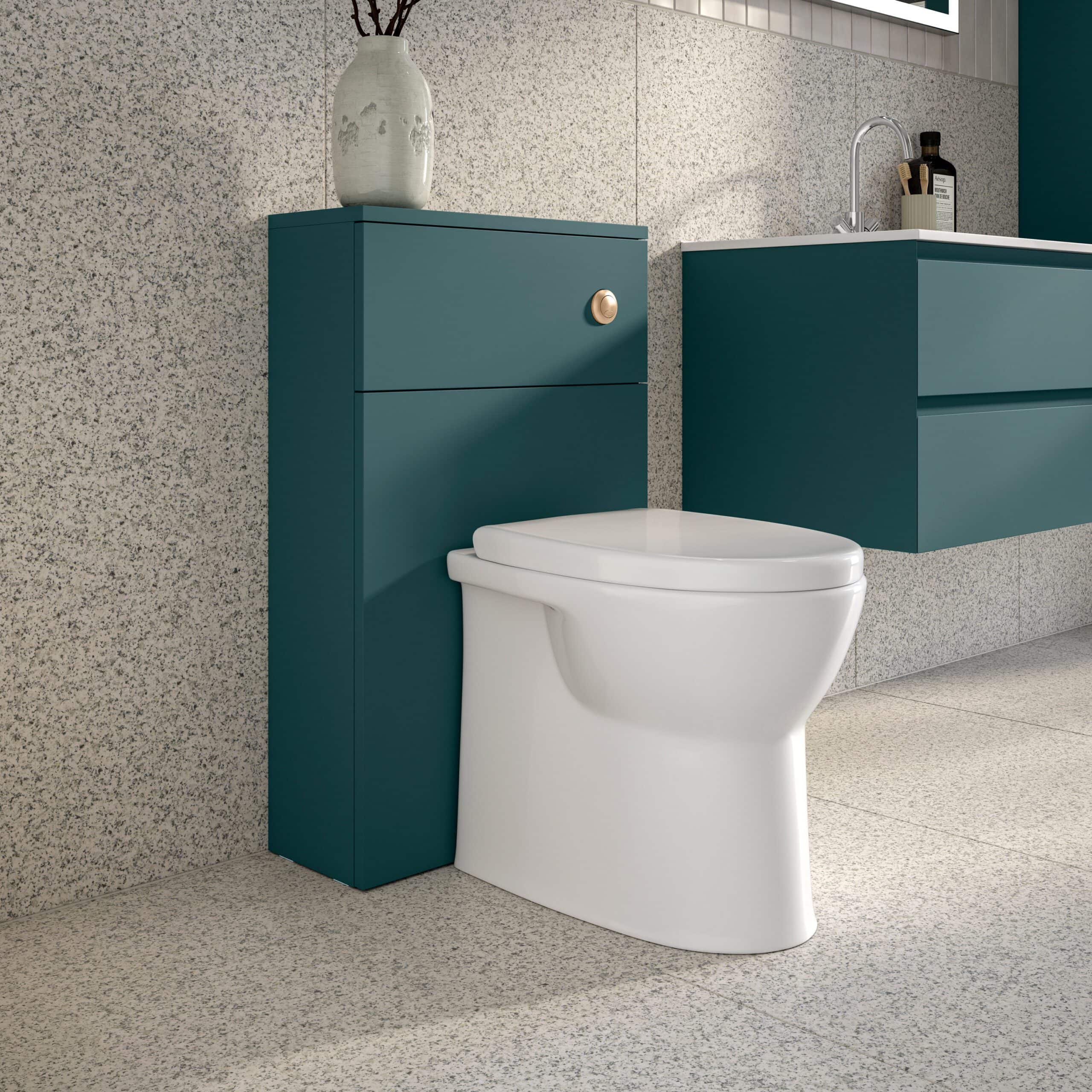 Sleek modern toilet with teal bathroom storage units and minimalist design, ideal for contemporary bathroom renovations and stylish utilities.
