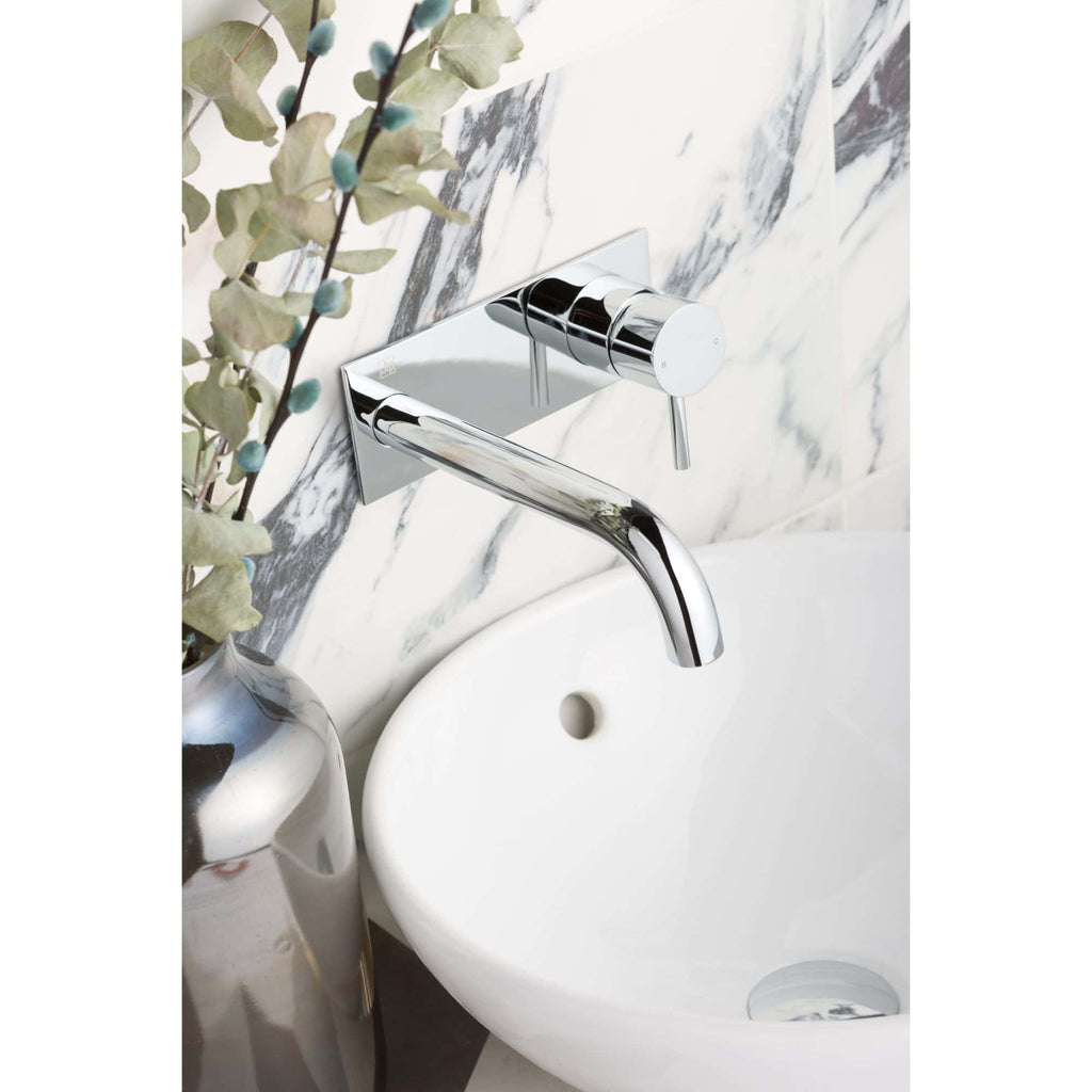 Sleek chrome wall-mounted bathroom faucet with a marble wall background, modern design, and elegant aesthetics. Ideal for contemporary bathroom remodels with quality fixtures.