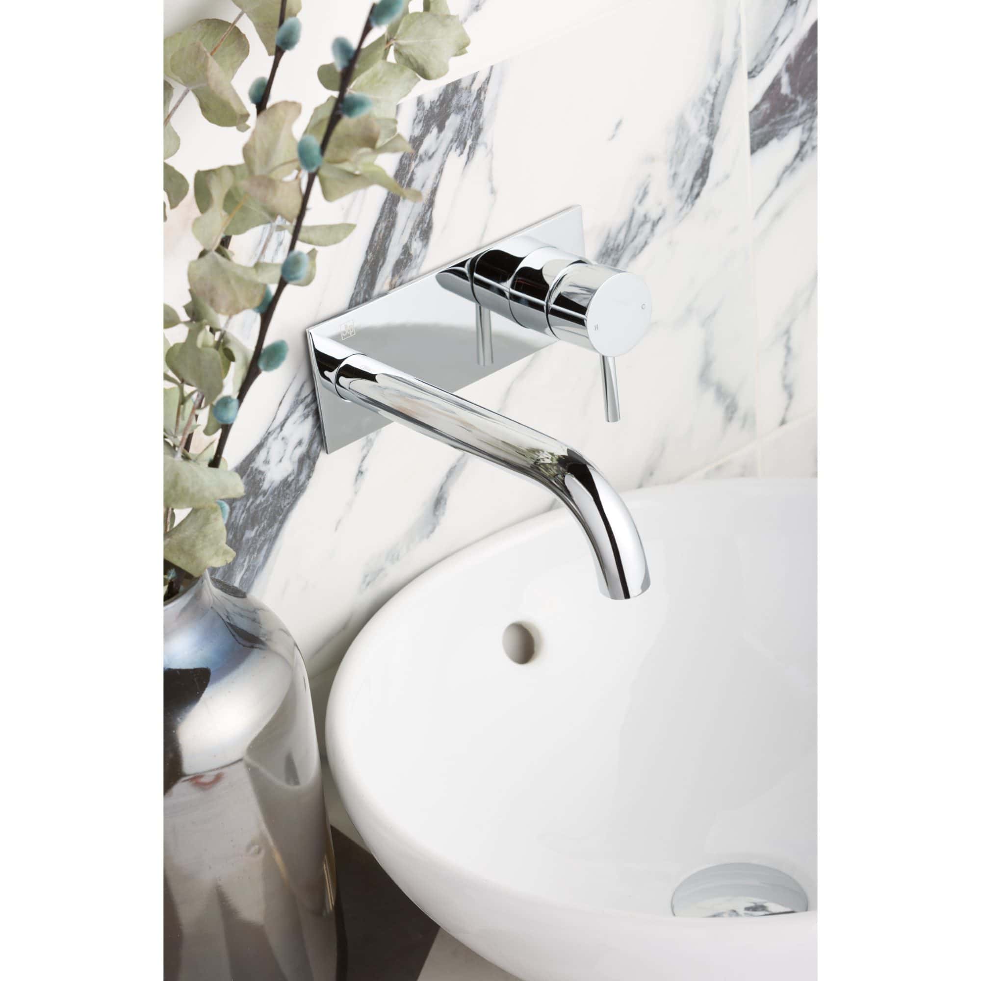 Sleek chrome wall-mounted bathroom faucet with a marble wall background, modern design, and elegant aesthetics. Ideal for contemporary bathroom remodels with quality fixtures.