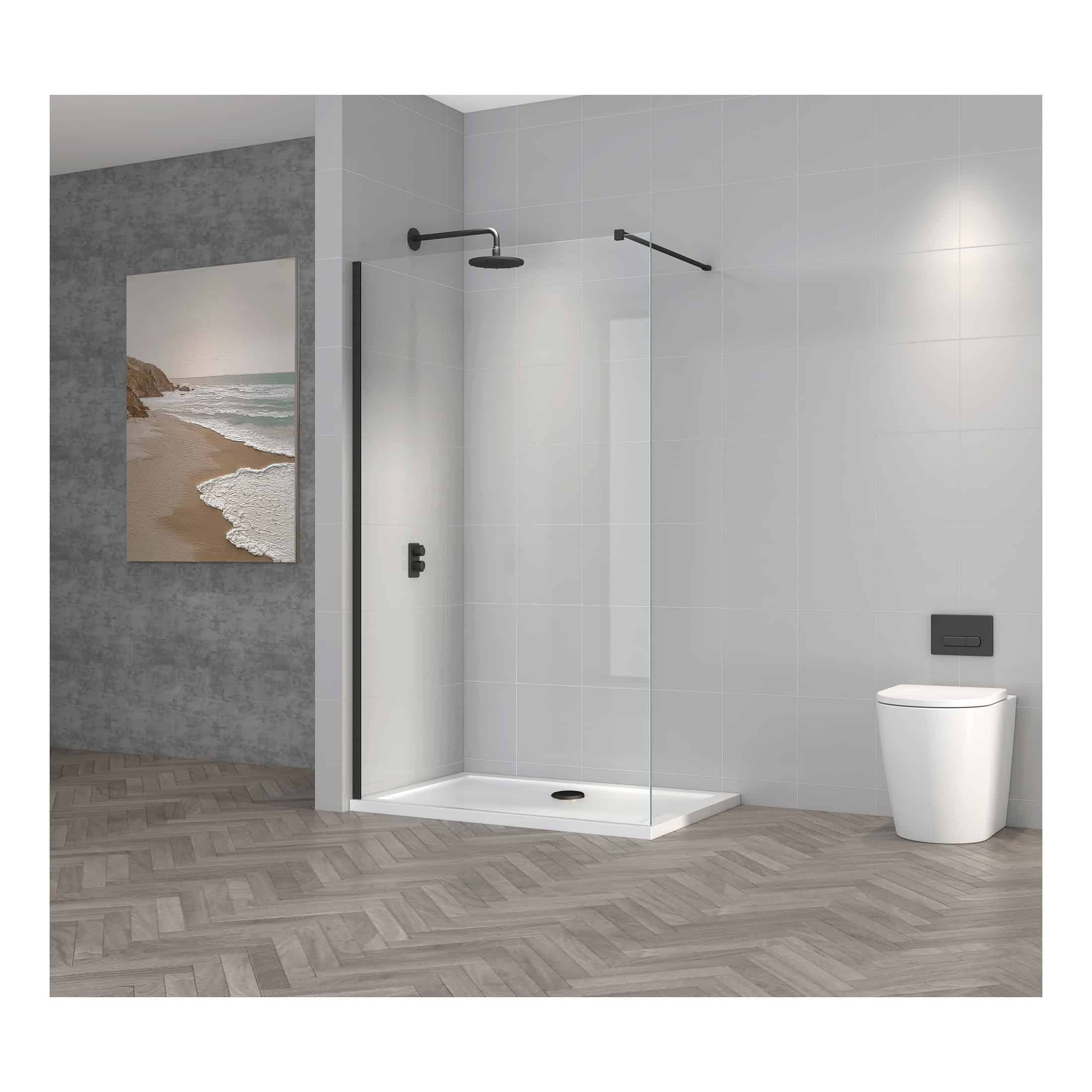 Modern walk-in shower with black fixtures and glass screen in a contemporary bathroom setting.