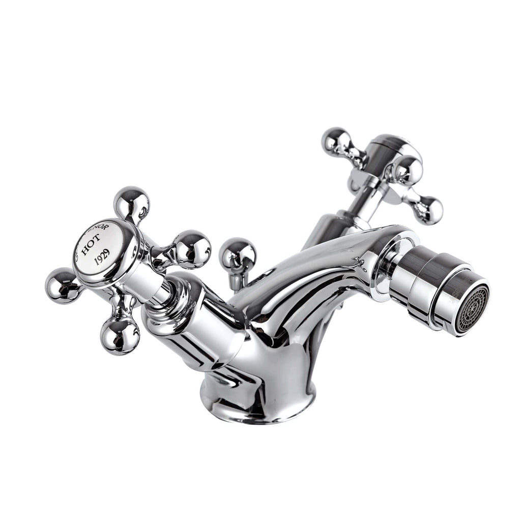 Chrome bathroom tap with vintage design, dual handles, and modern aerator, ideal for stylish bathroom sinks and washbasins. Perfect for contemporary and classic bathroom decor.