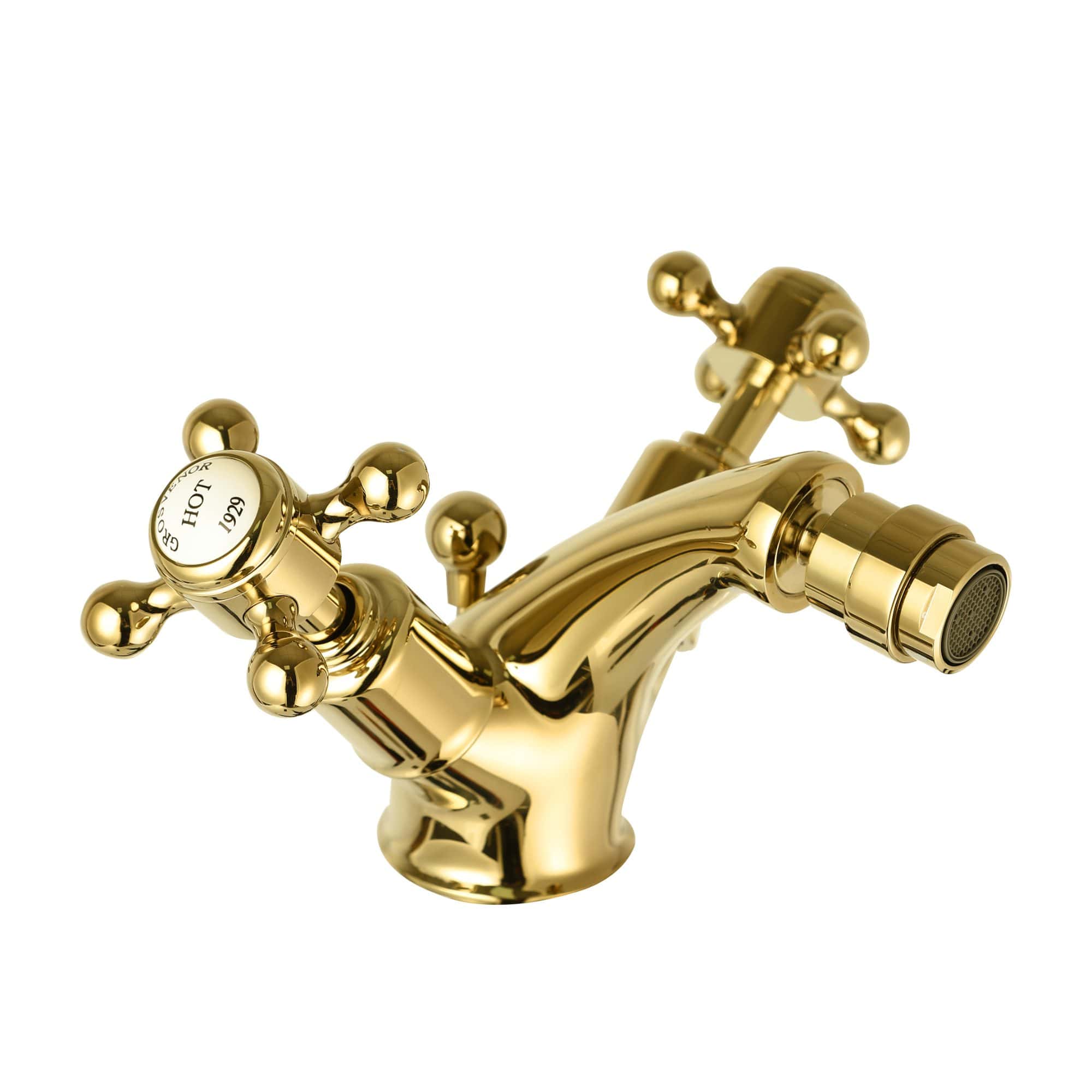 Luxurious gold bathroom tap with dual handles, classic design, ideal for vintage or traditional bathroom decor. Perfect for hot and cold water mixing in high-end bathrooms or cloakrooms.