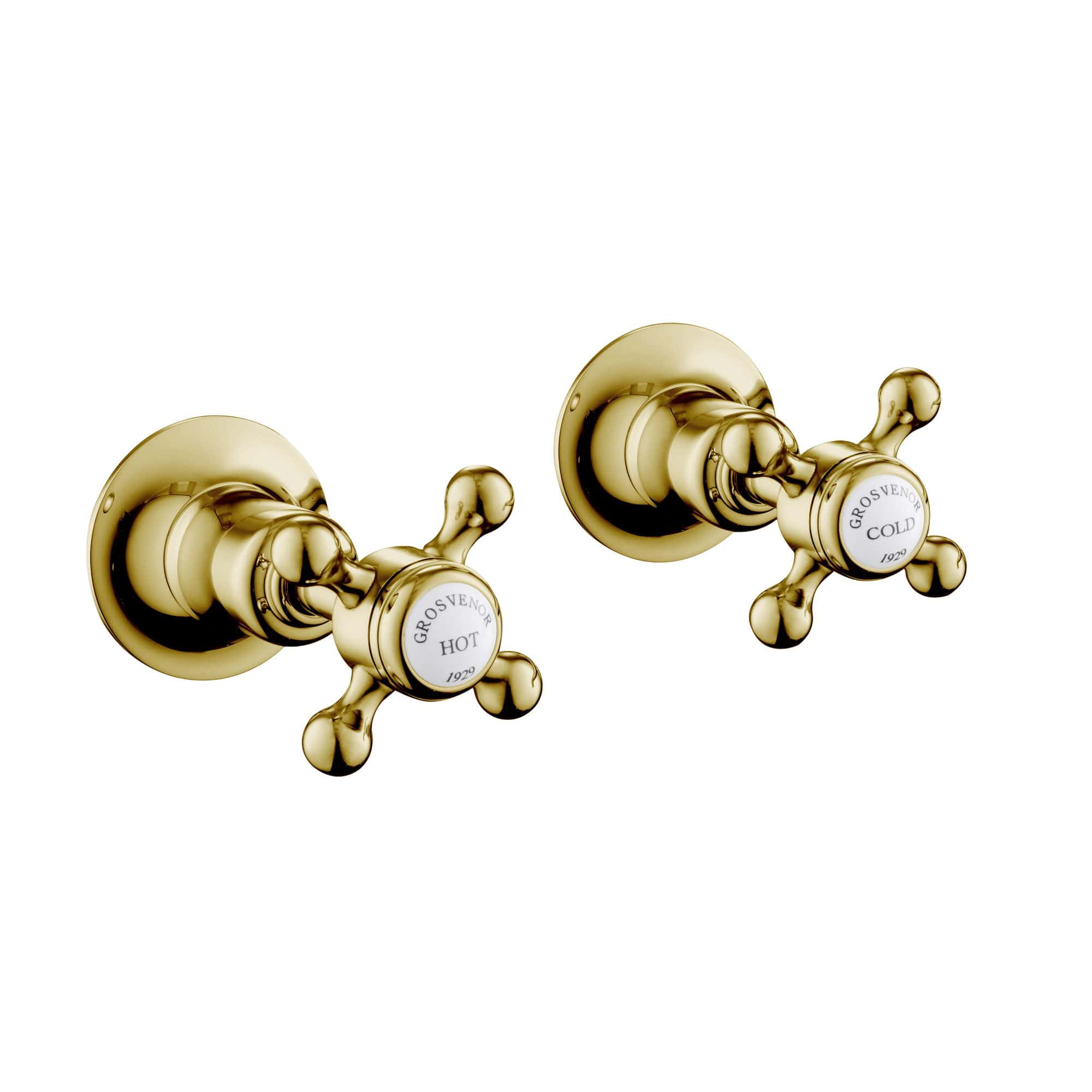 Shiny gold hot and cold bathroom taps with classic cross handles, ideal for luxury bathroom fixtures and modern plumbing. Perfect for enhancing bathroom aesthetics and functionality.