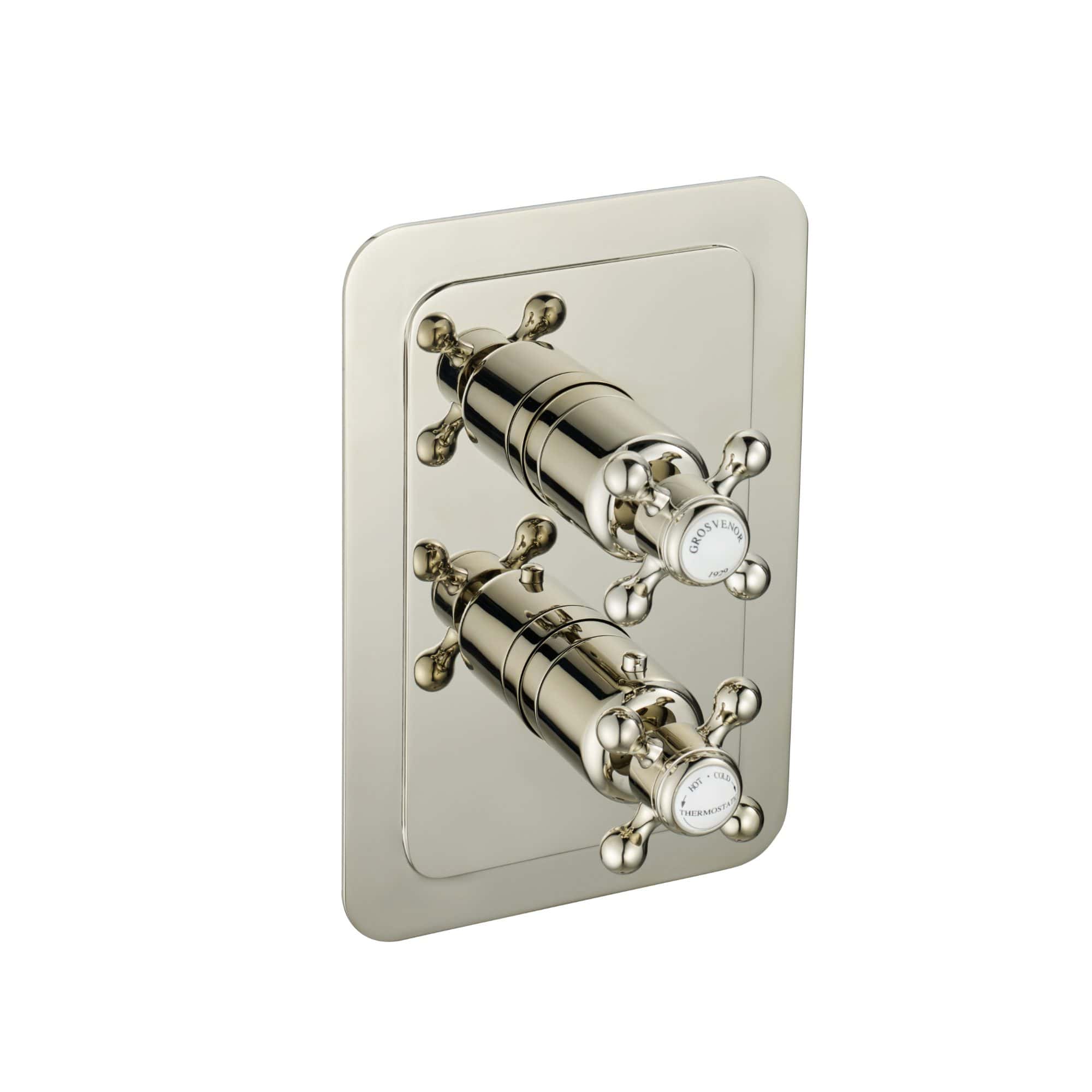 Shiny chrome double thermostat shower control knobs with vintage cross handles for personalised bath water temperature regulation.