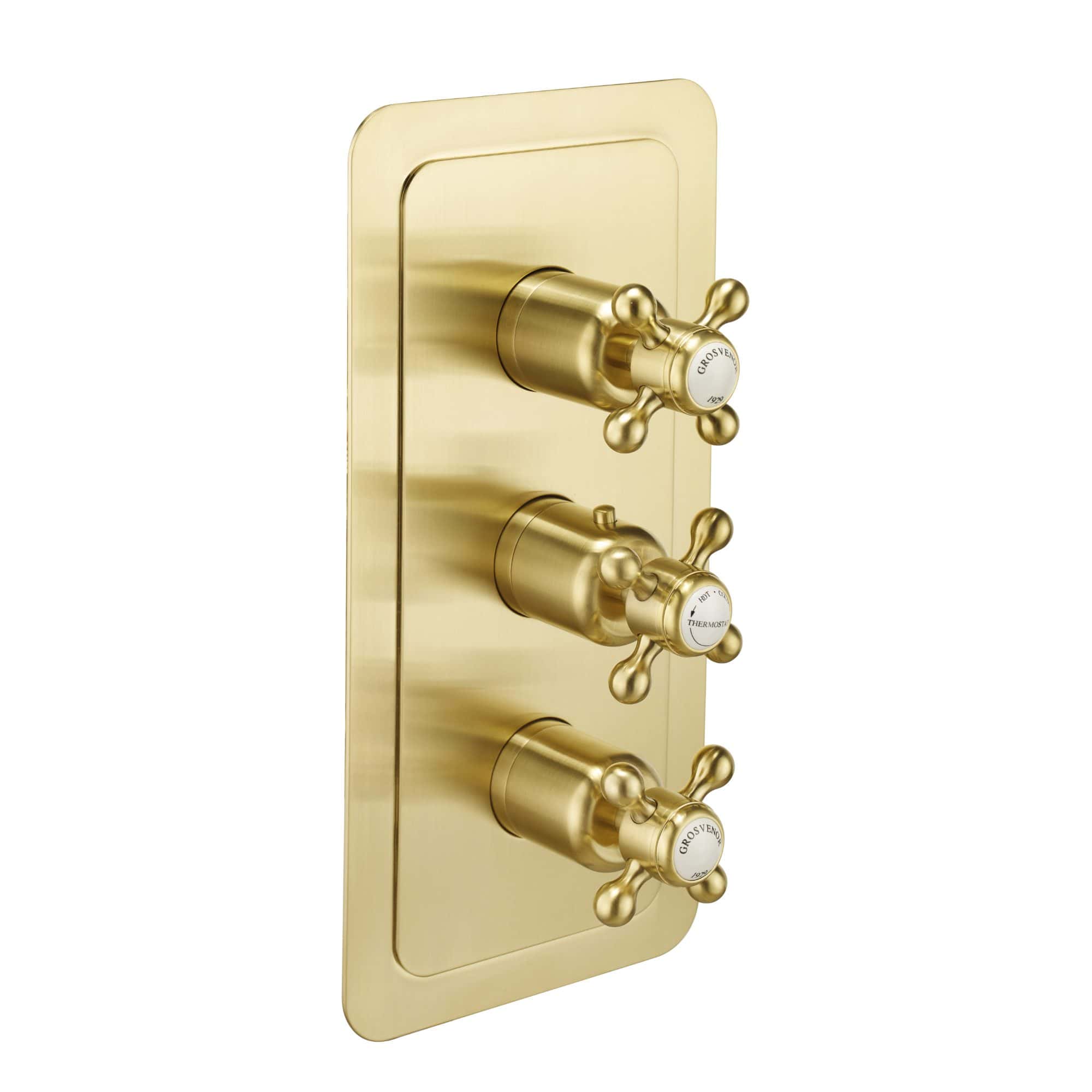Luxurious gold bathroom radiator valves with antique-style cross handles, designed for elegant and functional heating control in high-end bathrooms.