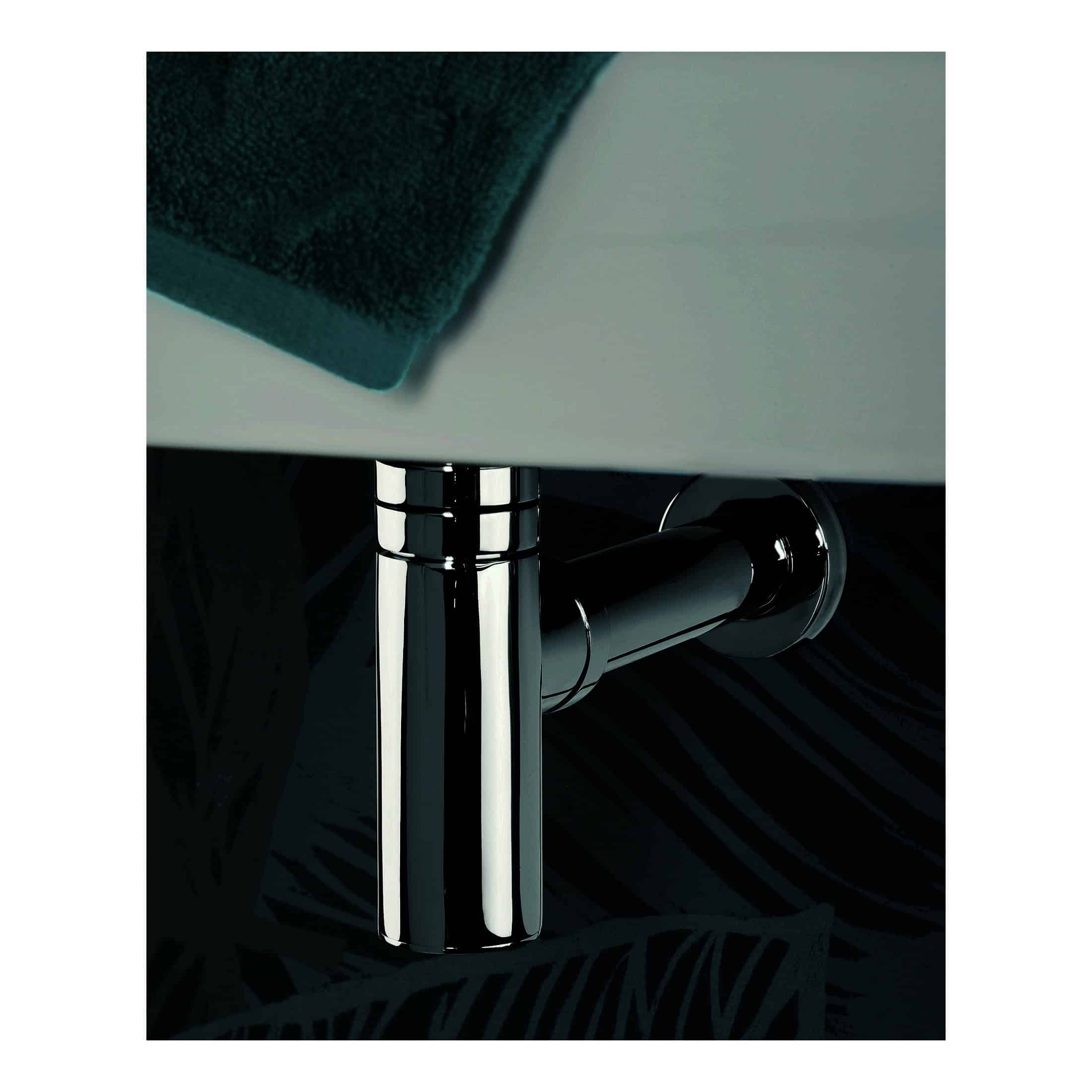 Sleek chrome bathroom furniture leg with black pipe under a white bathroom vanity, modern and stylish design, high-quality materials, ideal for contemporary bathroom interiors.