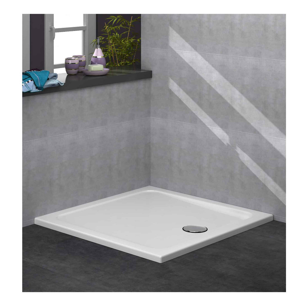 Shower tray with a modern, minimalist design installed in a contemporary bathroom with grey tiled walls and windowsill accessories, perfect for stylish wet room installations.