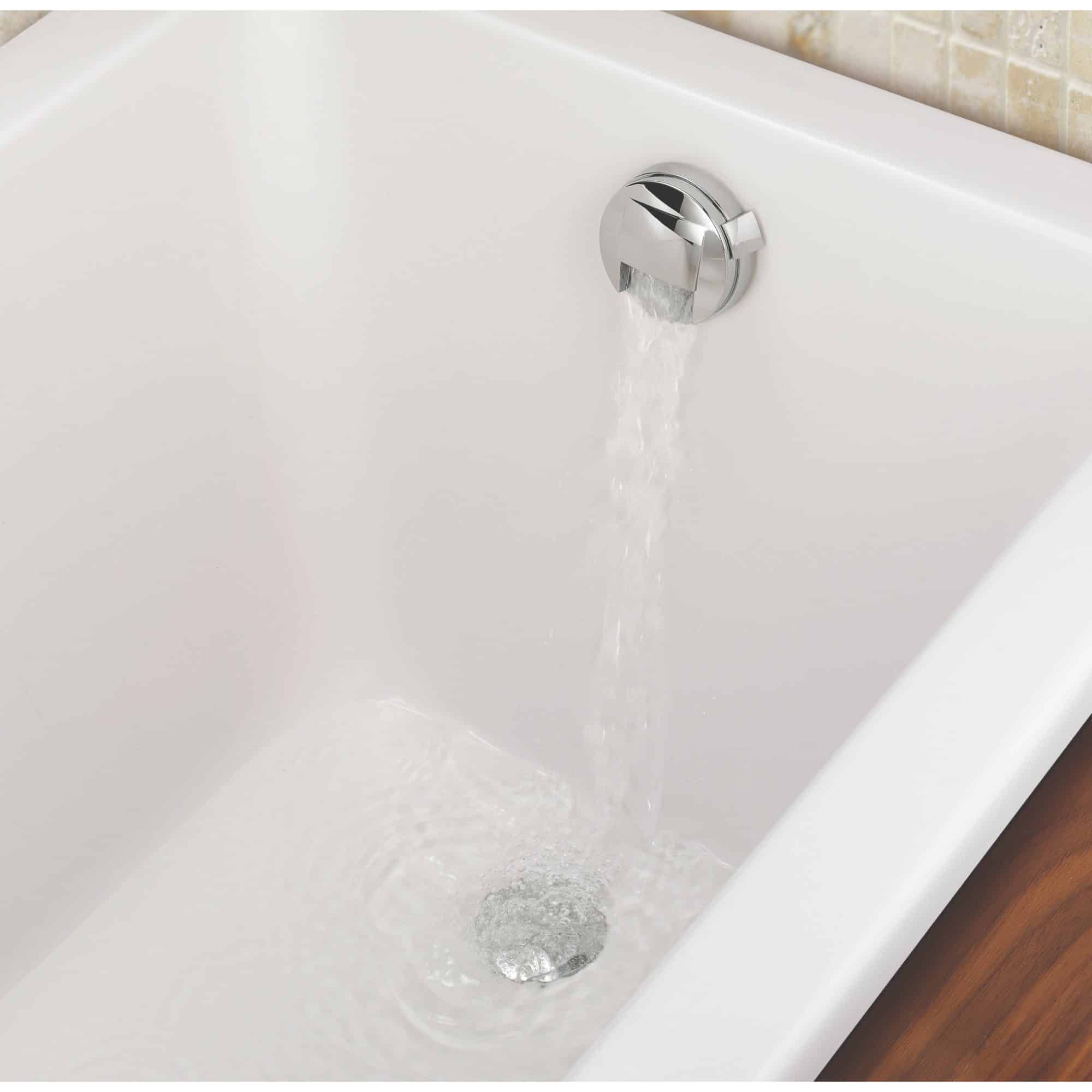Sleek modern bathtub with chrome overflow and drain, featuring efficient water flow – perfect for stylish bathroom renovations.