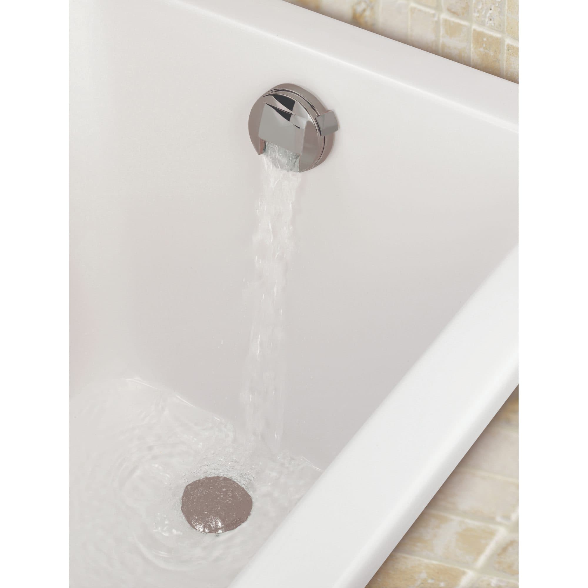 Shower bath with modern chrome overflow drain and water flowing into white bathtub, close-up of elegant bathroom fixtures for luxury bathroom design.
