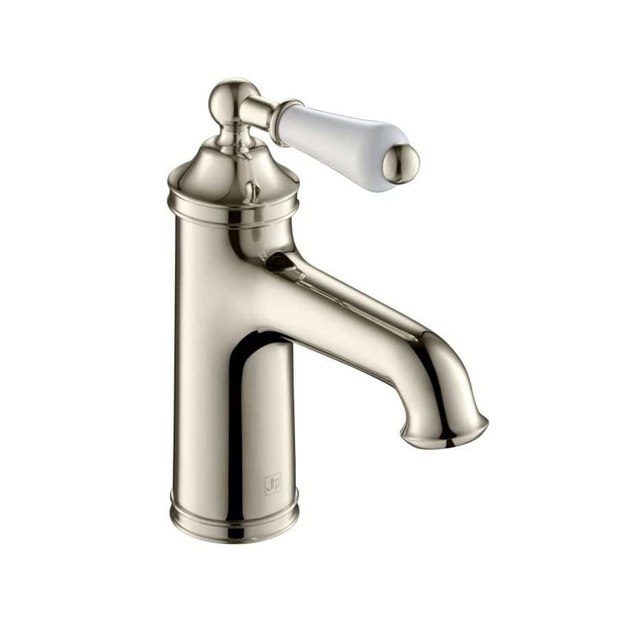 Polished chrome traditional bathroom tap with white ceramic handle.